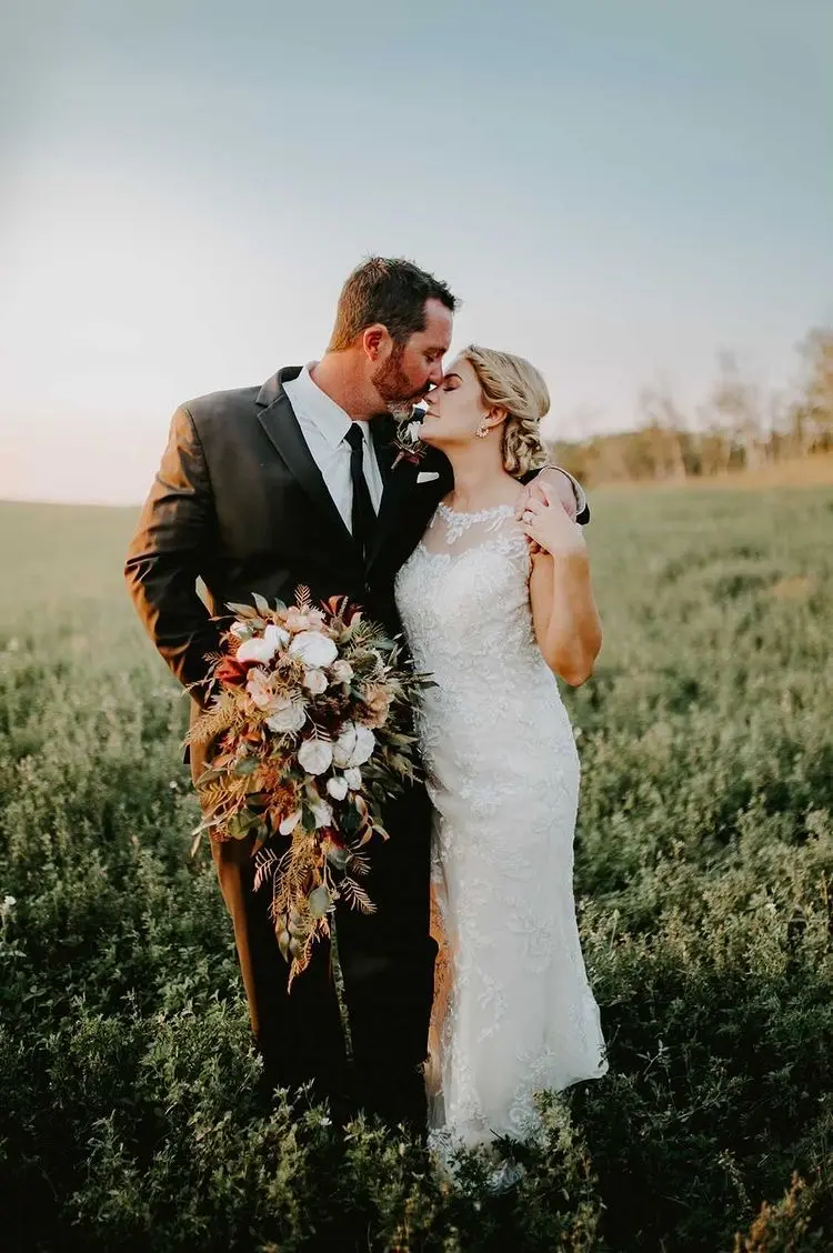 Groom With Bride Wearing Lace Wedding Dress With Illusion Back Verina Marie By Maggie Sottero