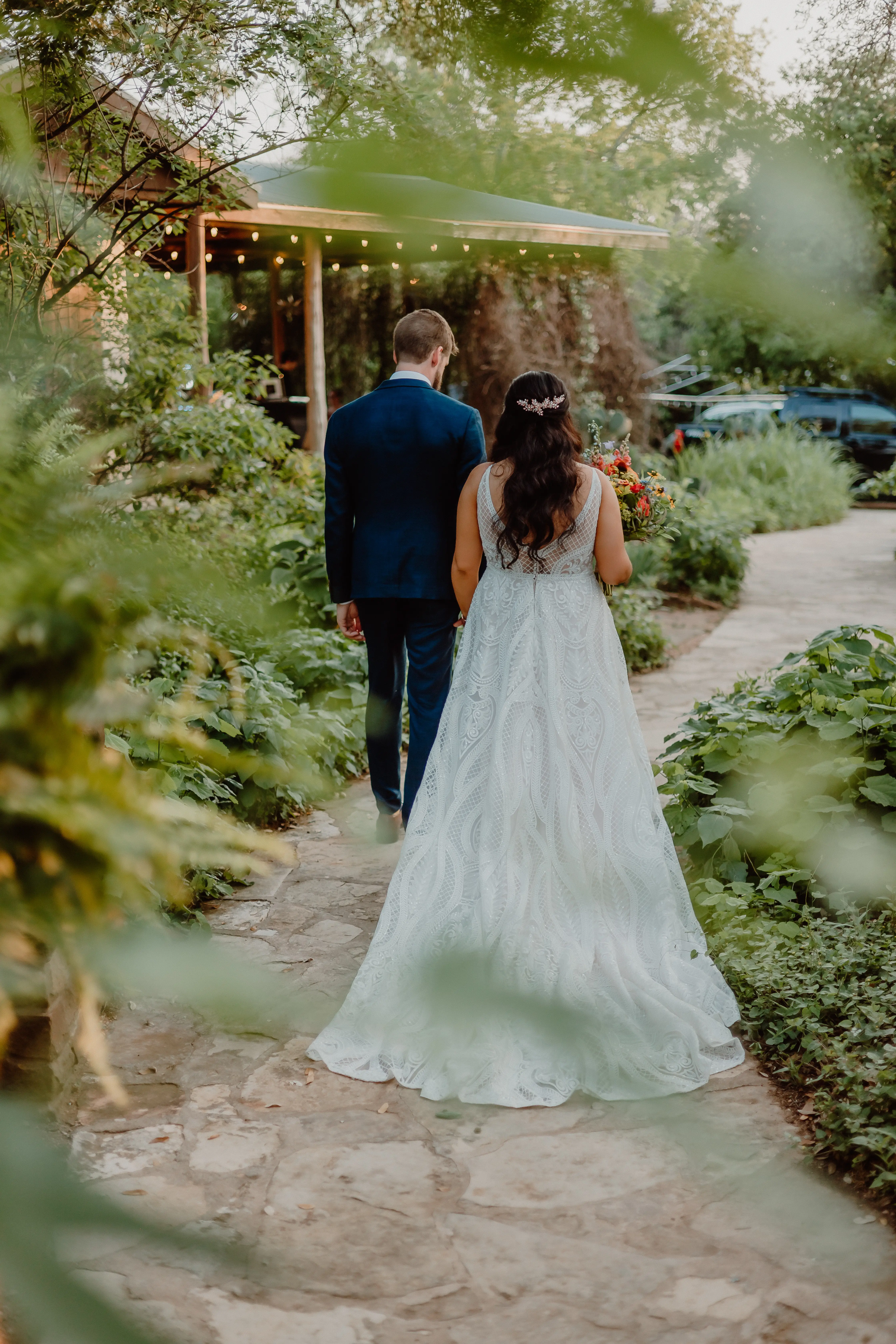 Groom Walking With Bride In Boho Lace Wedding Dress Called Roxanne By Sottero And Midgley