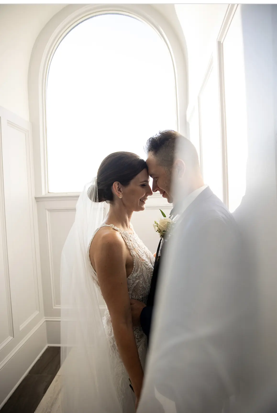 Groom With Bride Wearing Halter Style Crepe Wedding Dress Audrina By Maggie Sottero