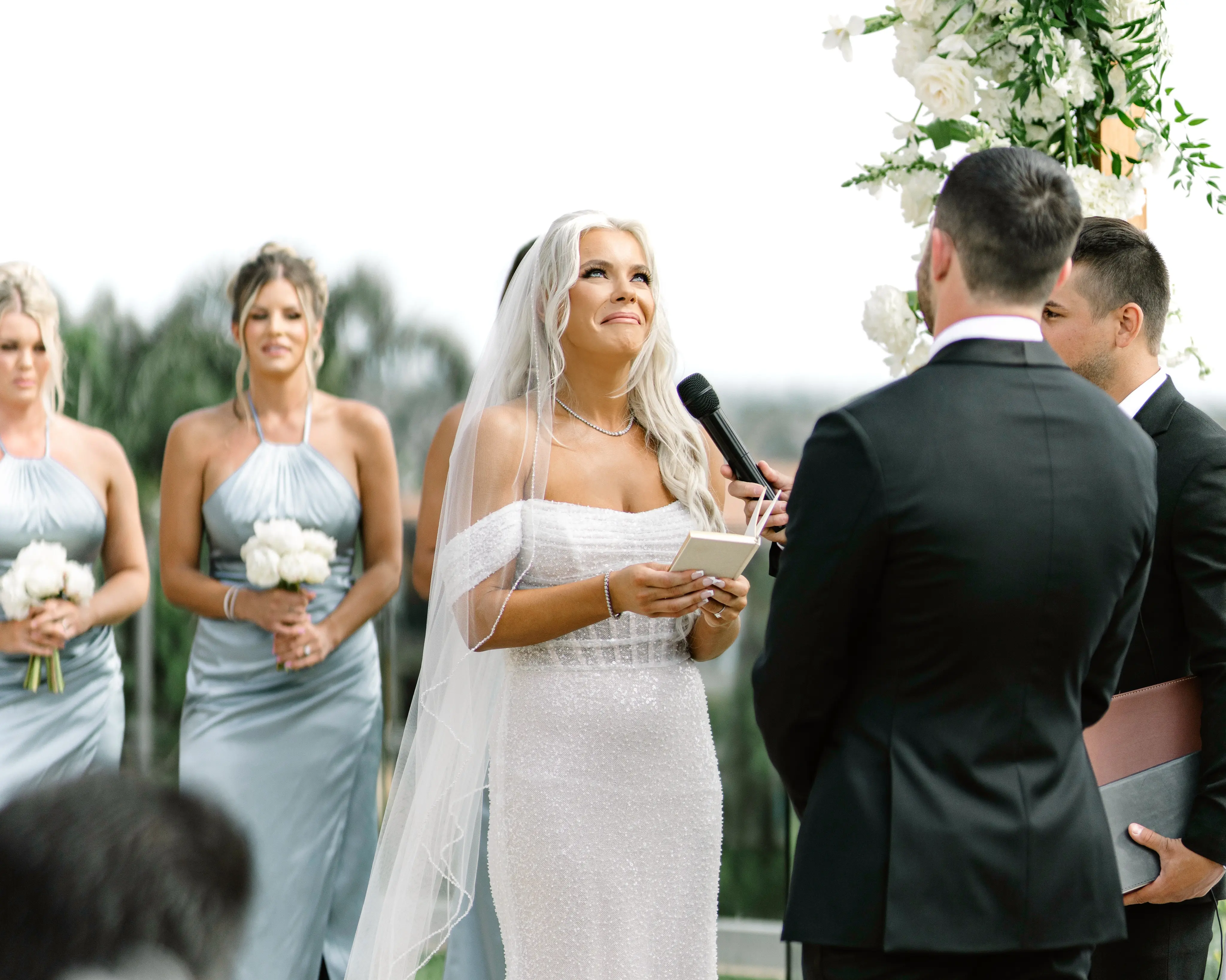 Bride Wearing Pearl Sparkly Bridal Gown Called Drew By Maggie Sottero Saying Her Vows