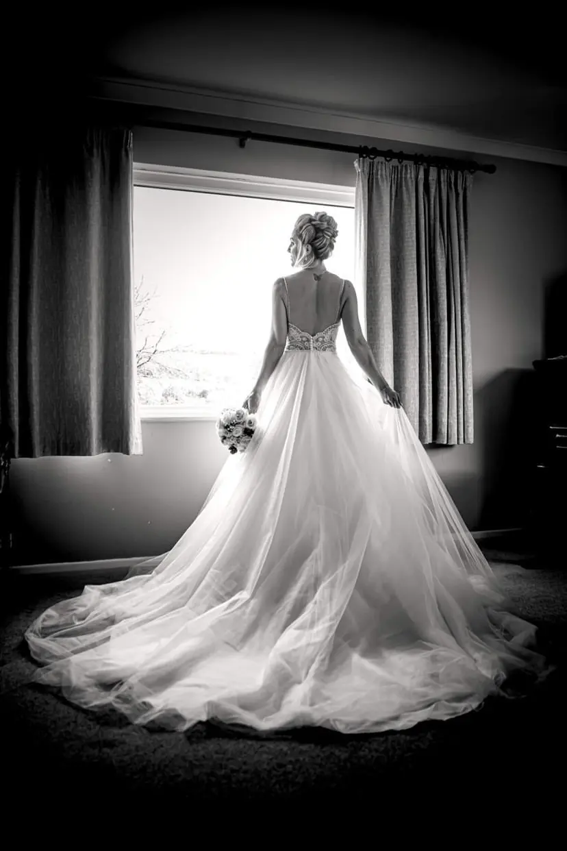 Back of bride wearing wedding dress called Mallory.