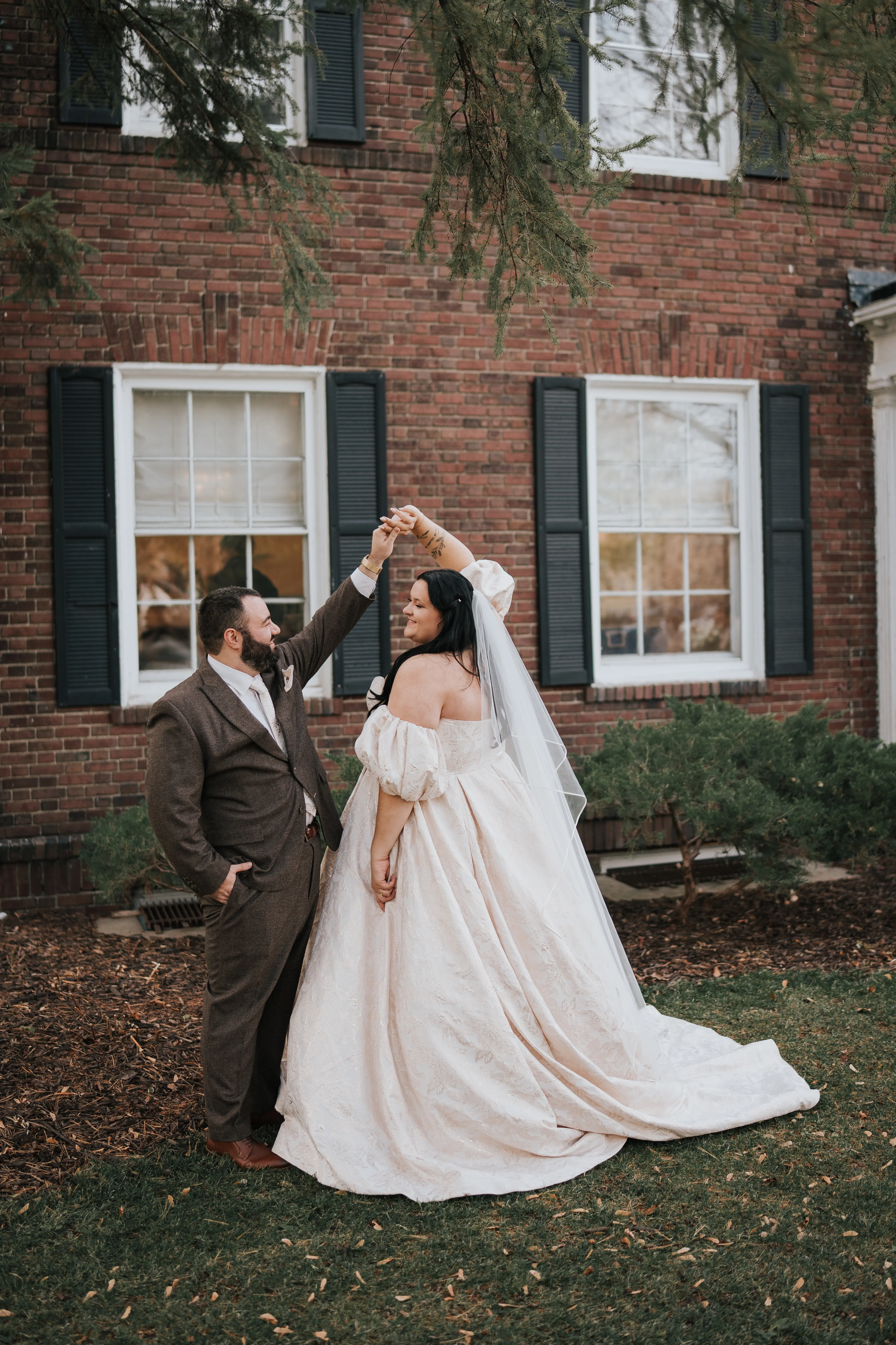 Bride Wearing Floral Jacquard Princess Wedding Gown Called Cyprus By Sottero And Midgley Dancing With Groom