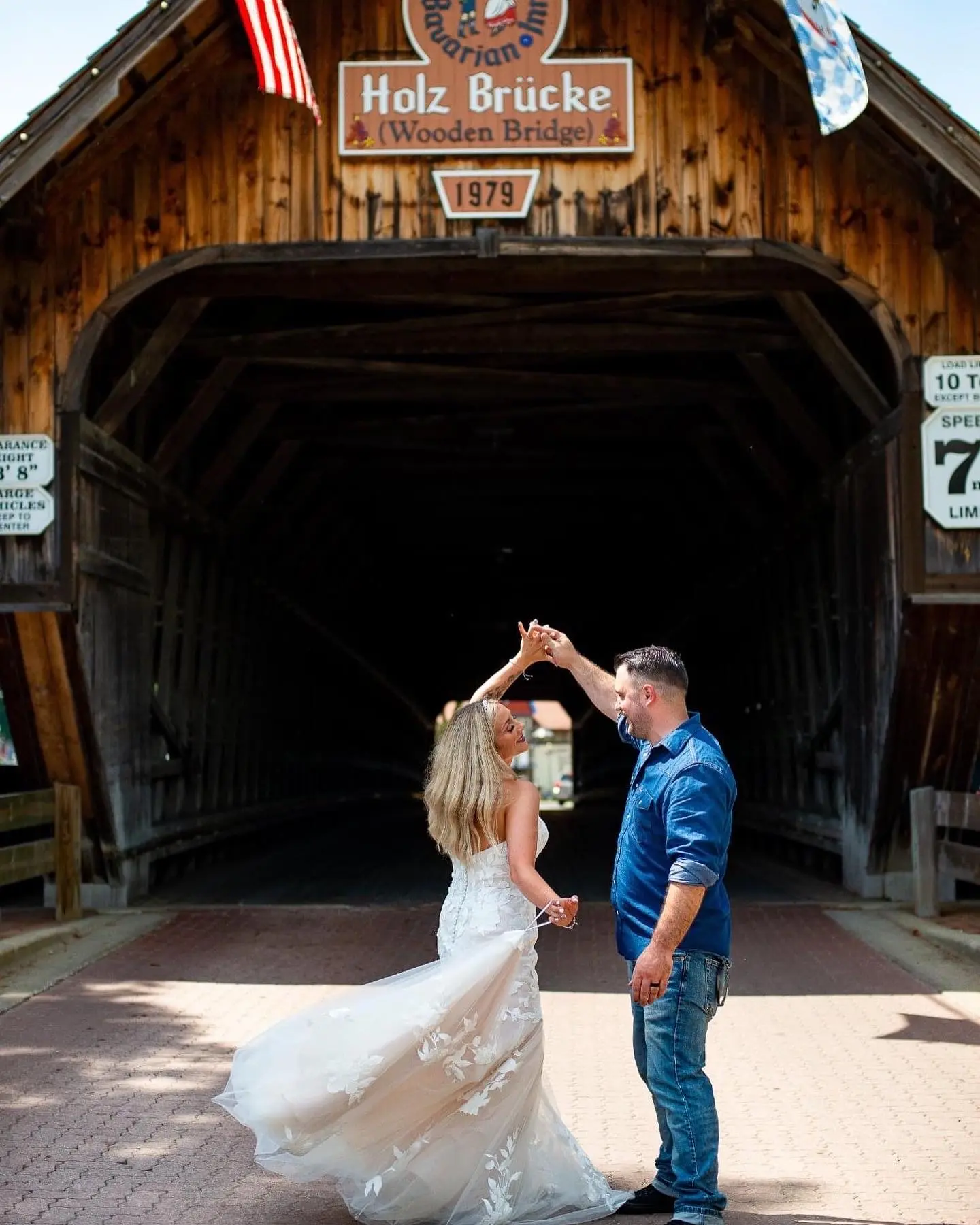 Groom With Bride Wearing Strapless Mermaid Wedding Dress With Over Sized Lace Hattie By Rebecca Ingram