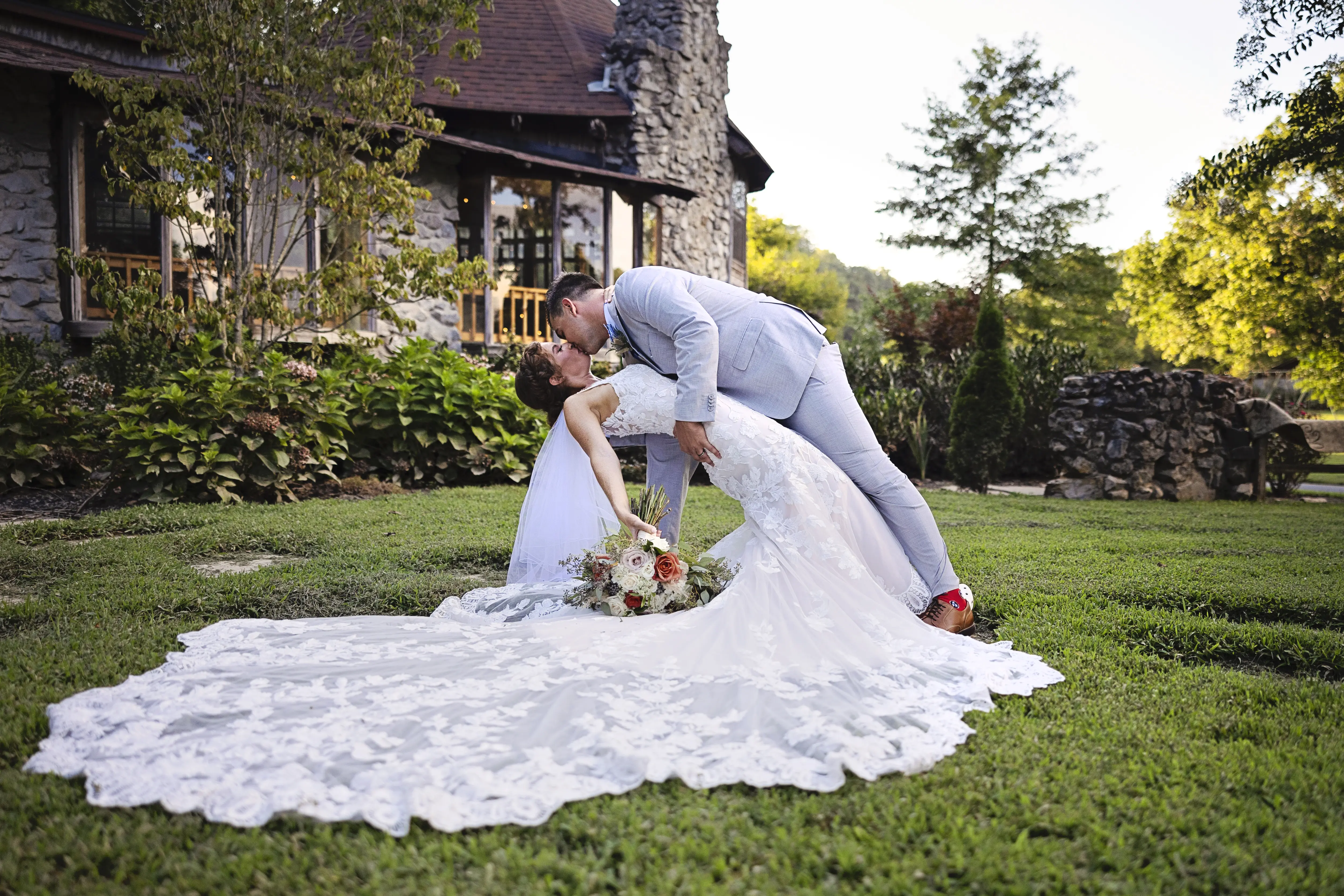 Bride In Lace Fit-And-Flare Wedding Dress Called Giana By Maggie Sottero With Groom