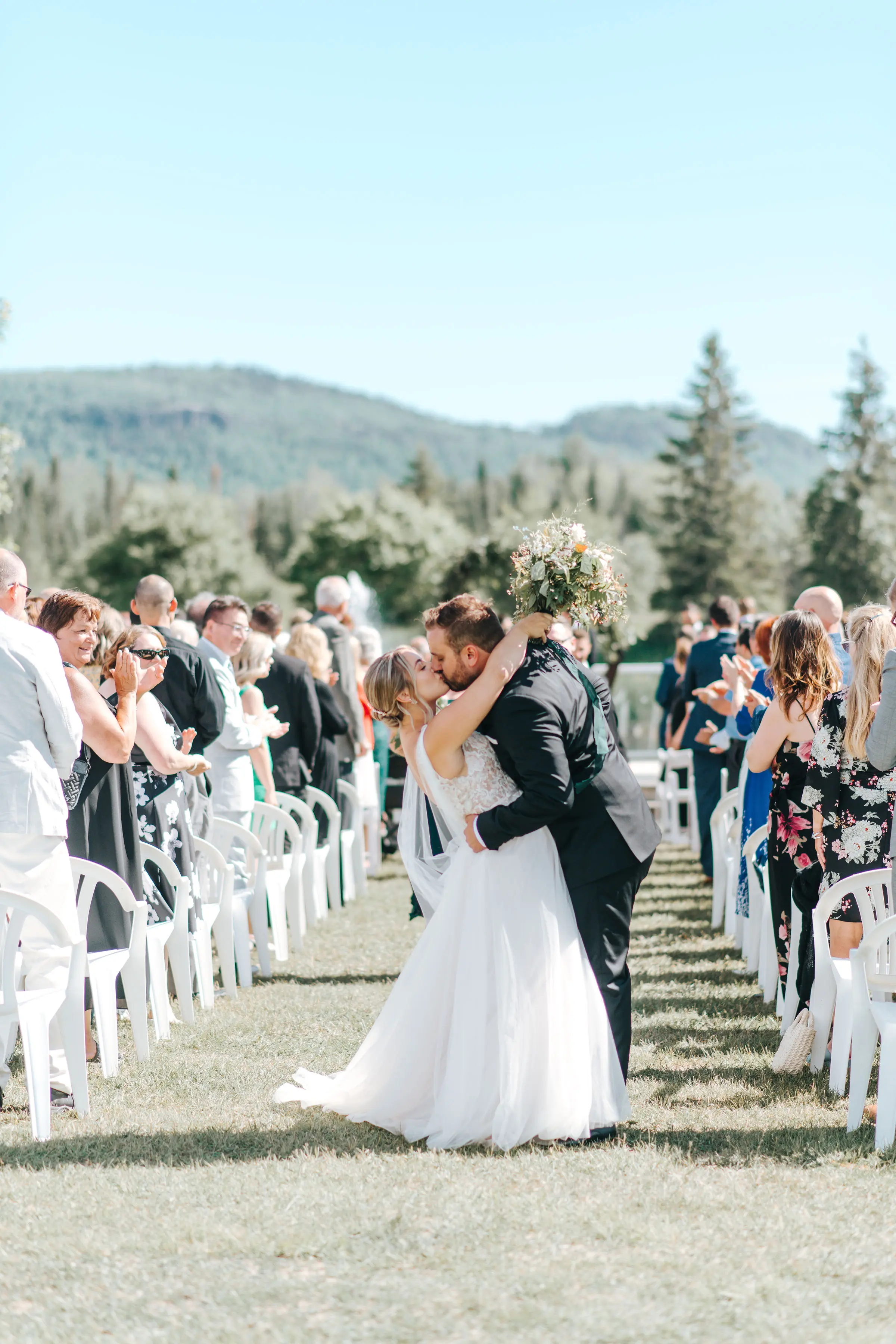 Groom With Bride Wearing V-Neck A-Line Wedding Dress Minerva By Rebecca Ingram