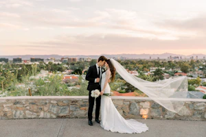 Bride Wearing Vintage Art Deco Wedding Dress Called Elaine By Maggie Sottero With Groom Overlooking The City
