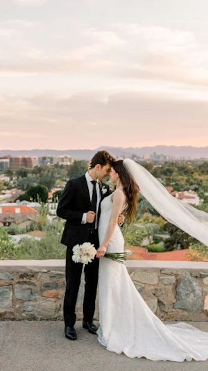 Bride Wearing Vintage Art Deco Wedding Dress Called Elaine By Maggie Sottero With Groom Overlooking The City