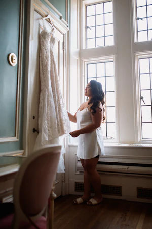 Bride Looking At Floral Fit-And-Flare