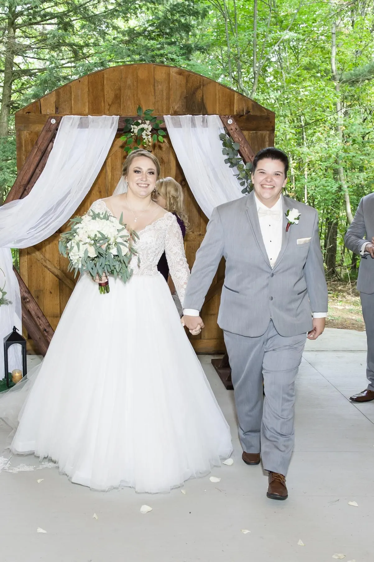 Newlyweds with Bride in Romantic Ball Gown Wedding Dress with Illusion Plunging V-Neckline Called Mallory Dawn by Maggie Sottero