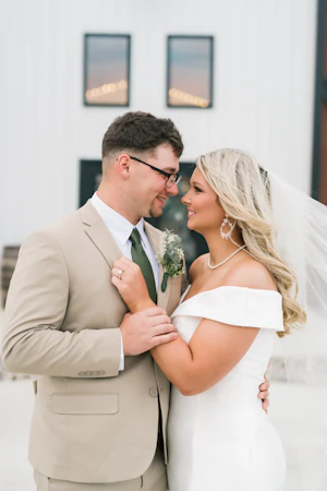 Bride wearing Josie wedding dress by Rebecca Ingram with her husband