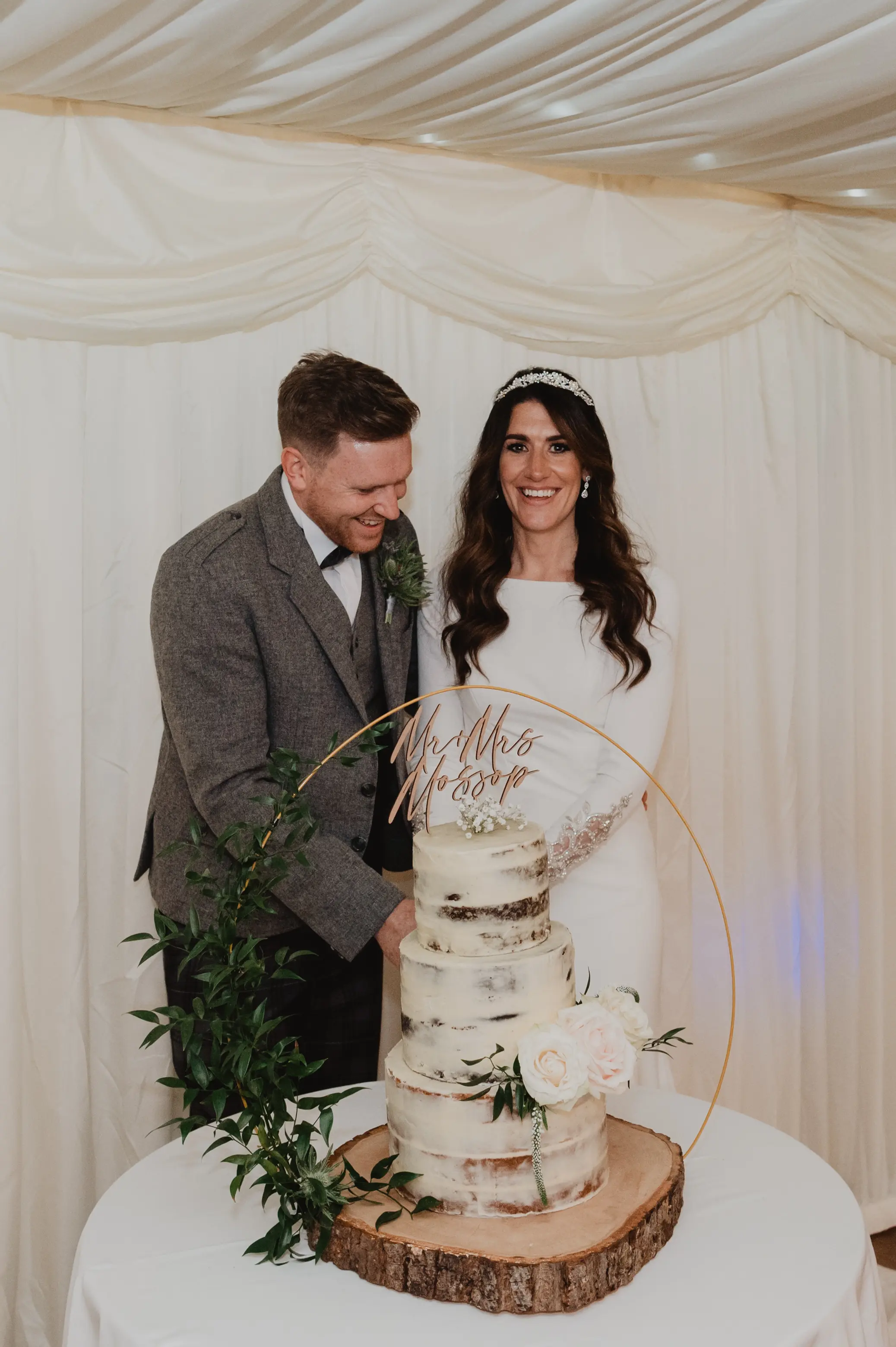 Real Bride in Crepe Fit-and-Flare Wedding Dress with a Statement Back of Beaded Illusion Embroidery Featuring Swarovski Crystals Called Aston by Sottero & Midgely