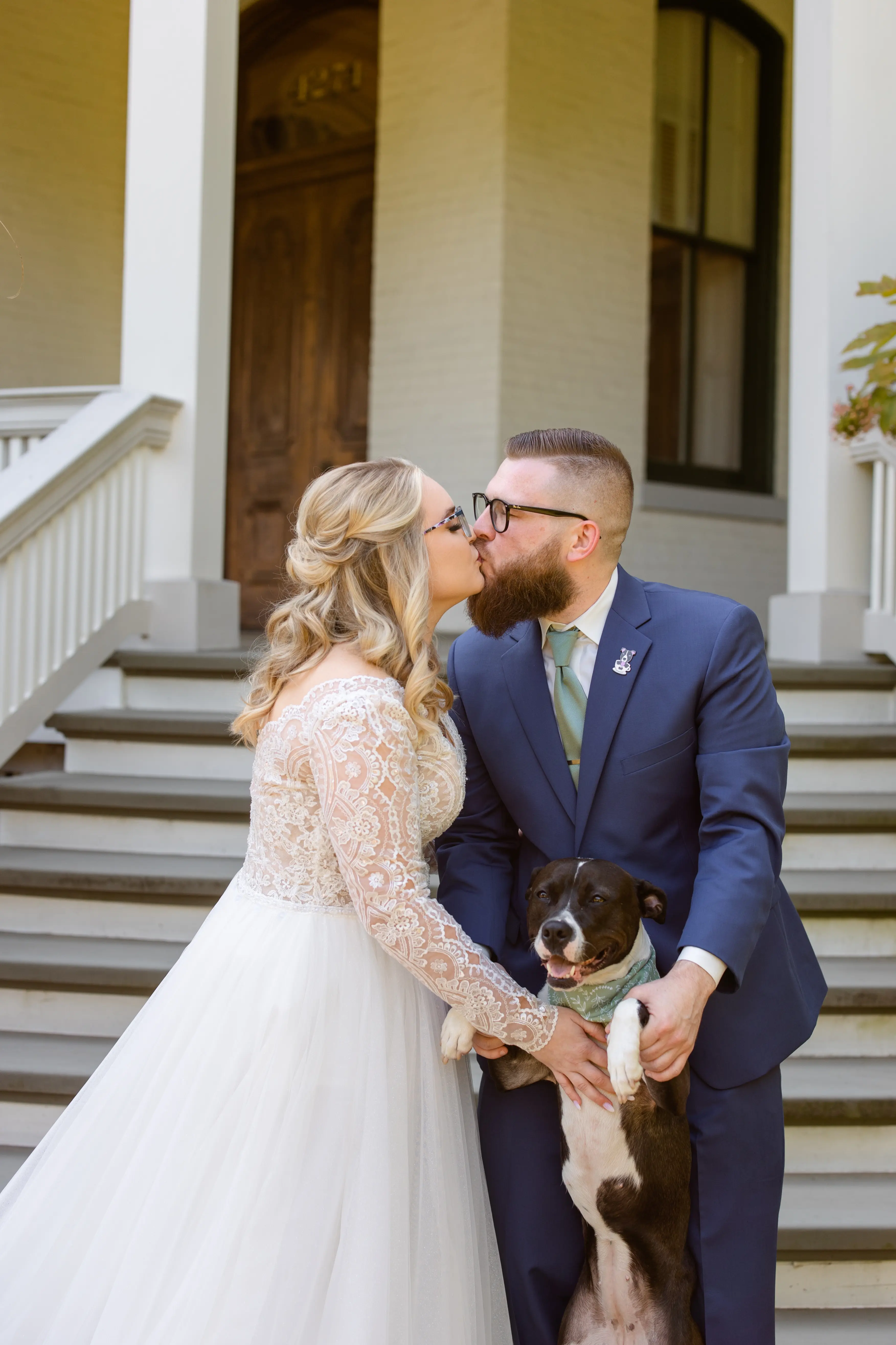 Bride In Plunging Lace Illusion Neckline Called Mallory Dawn By Maggie Sottero With Groom And Dog