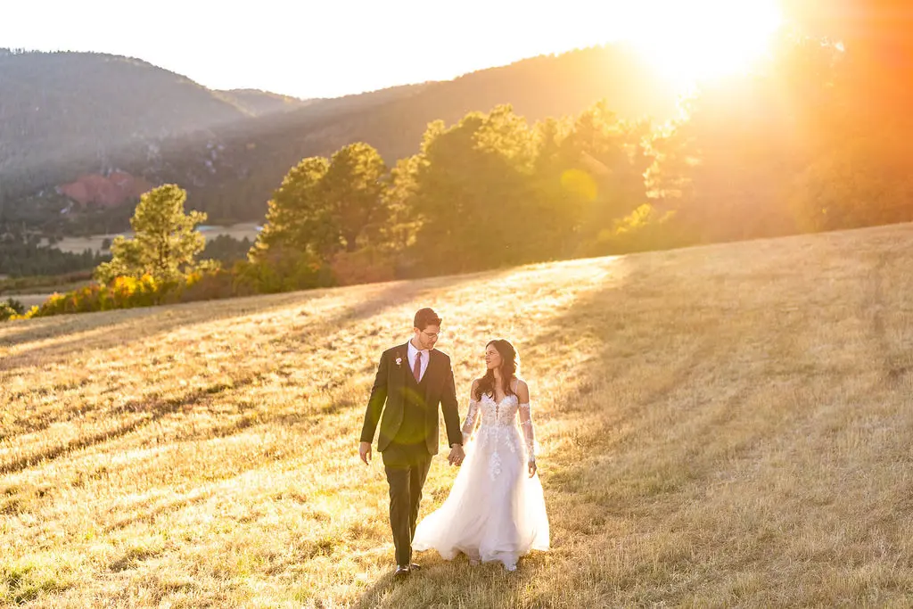 Bride with groom wearing boho A-line wedding dress