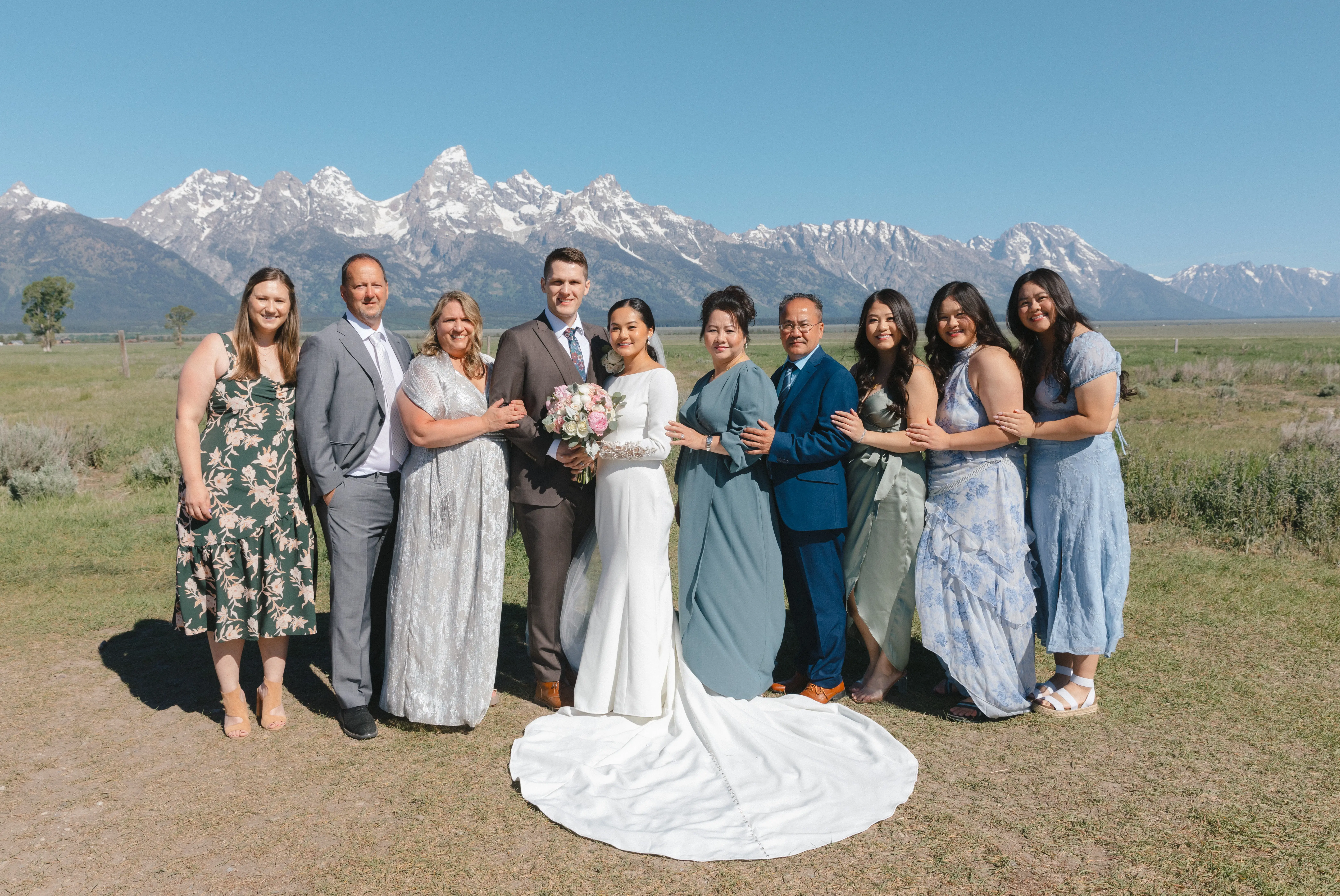 Bride wearing Aston by Sottero and Midgley with her wedding party