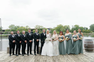Bride Wearing Lace Princess Wedding Dress Called Norvinia By Sottero And Midgley With Bridal Party