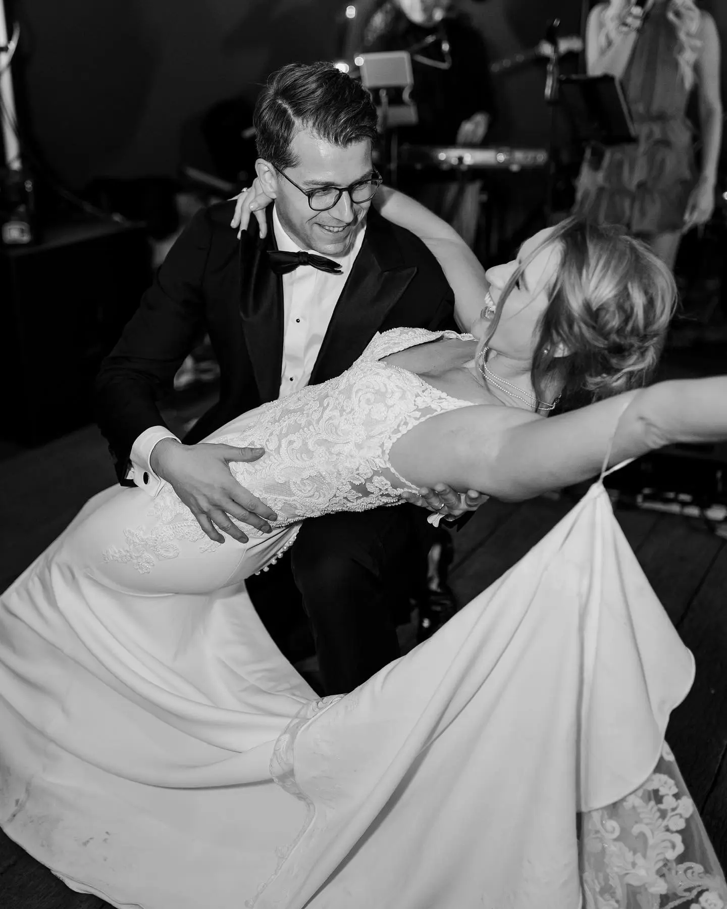 Groom Dipping Bride Wearing Lace Mermaid Wedding Dress Called Nikki By Maggie Sottero