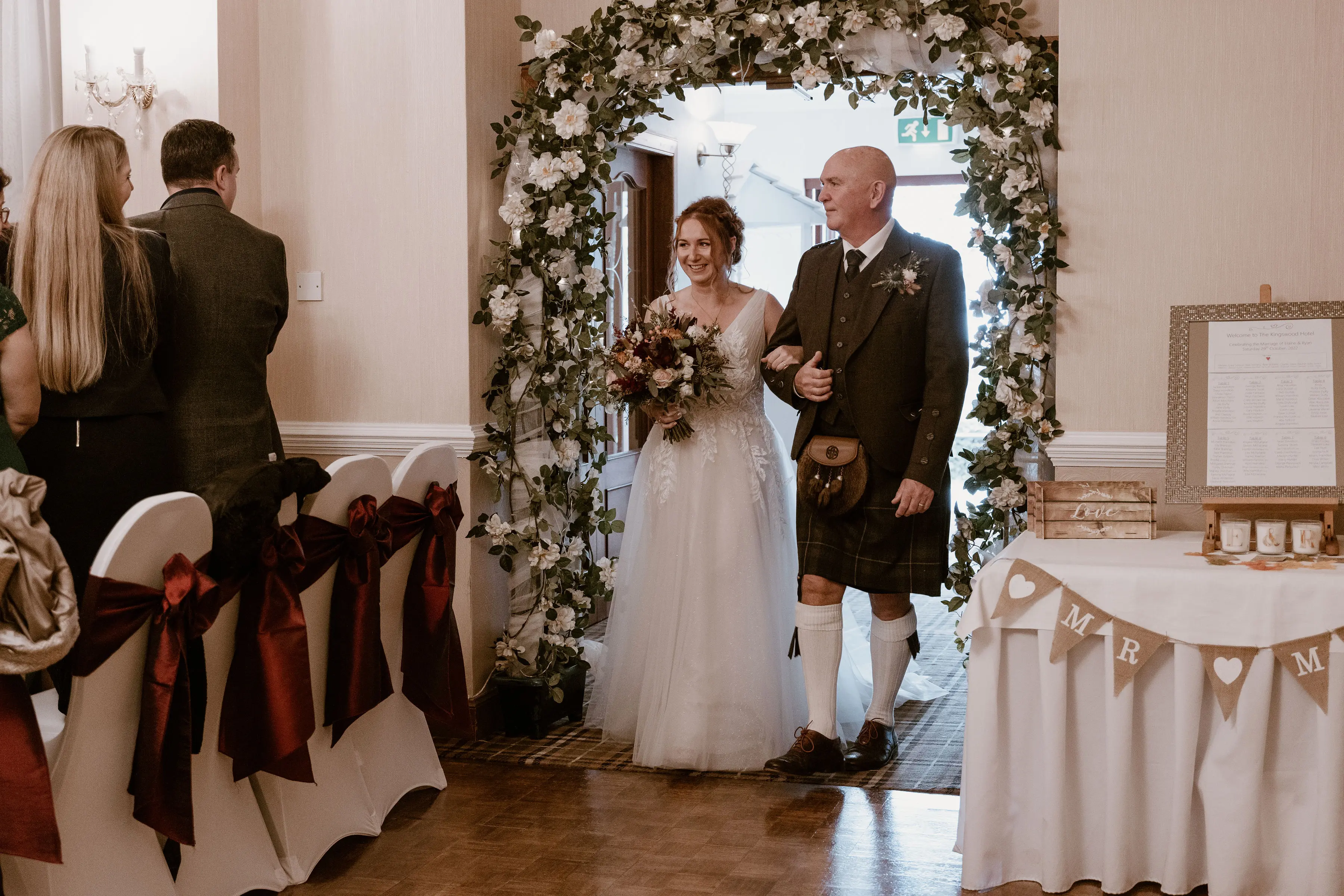 Real Bride in Nature-Inspired Tulle Wedding Dress with Plunging V-Neckline Called Jenessa by Rebecca Ingram