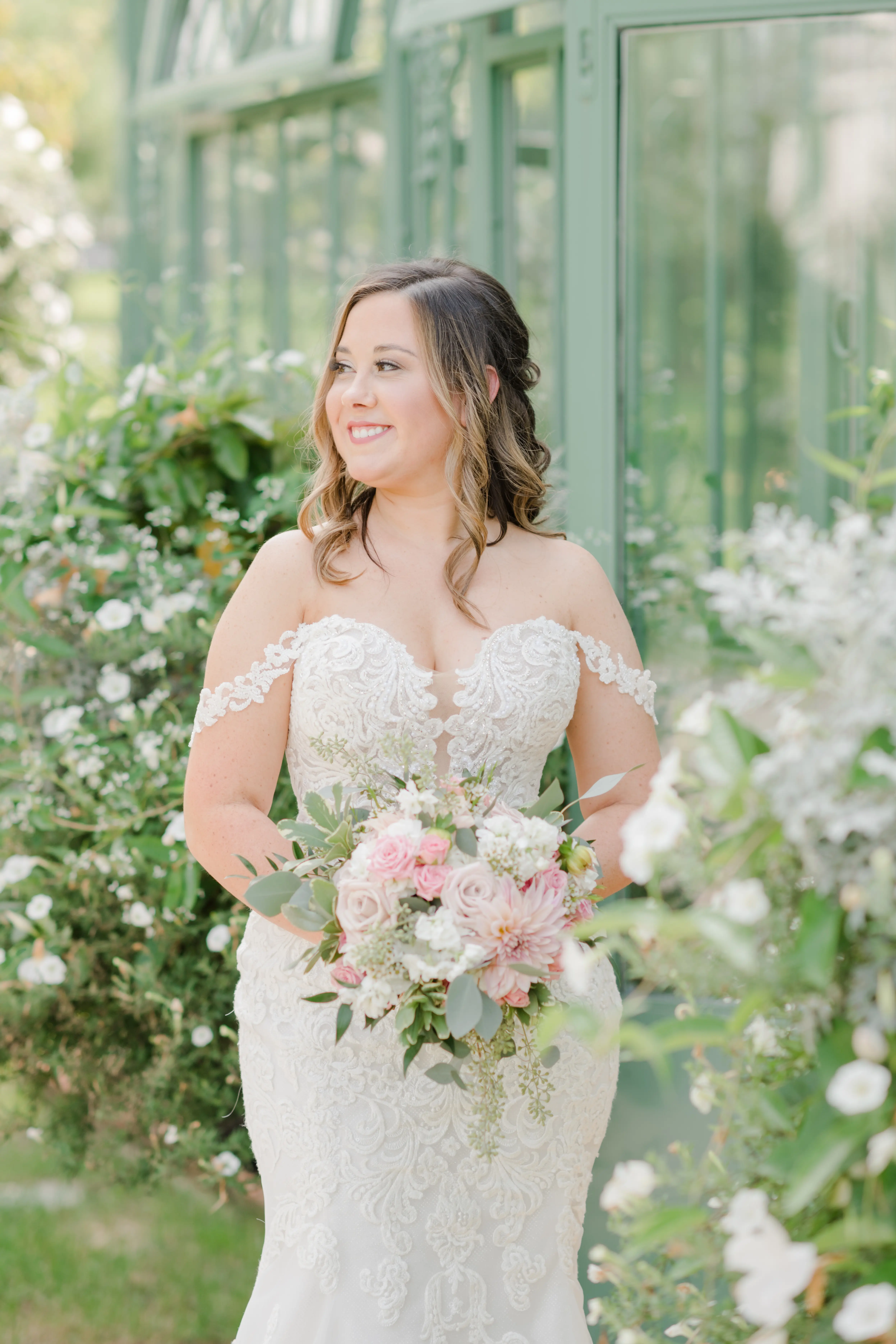 Real bride's sparkly lace fit-and-flare bridal dress with plunging illusion sweetheart neckline called Fiona by Maggie Sottero