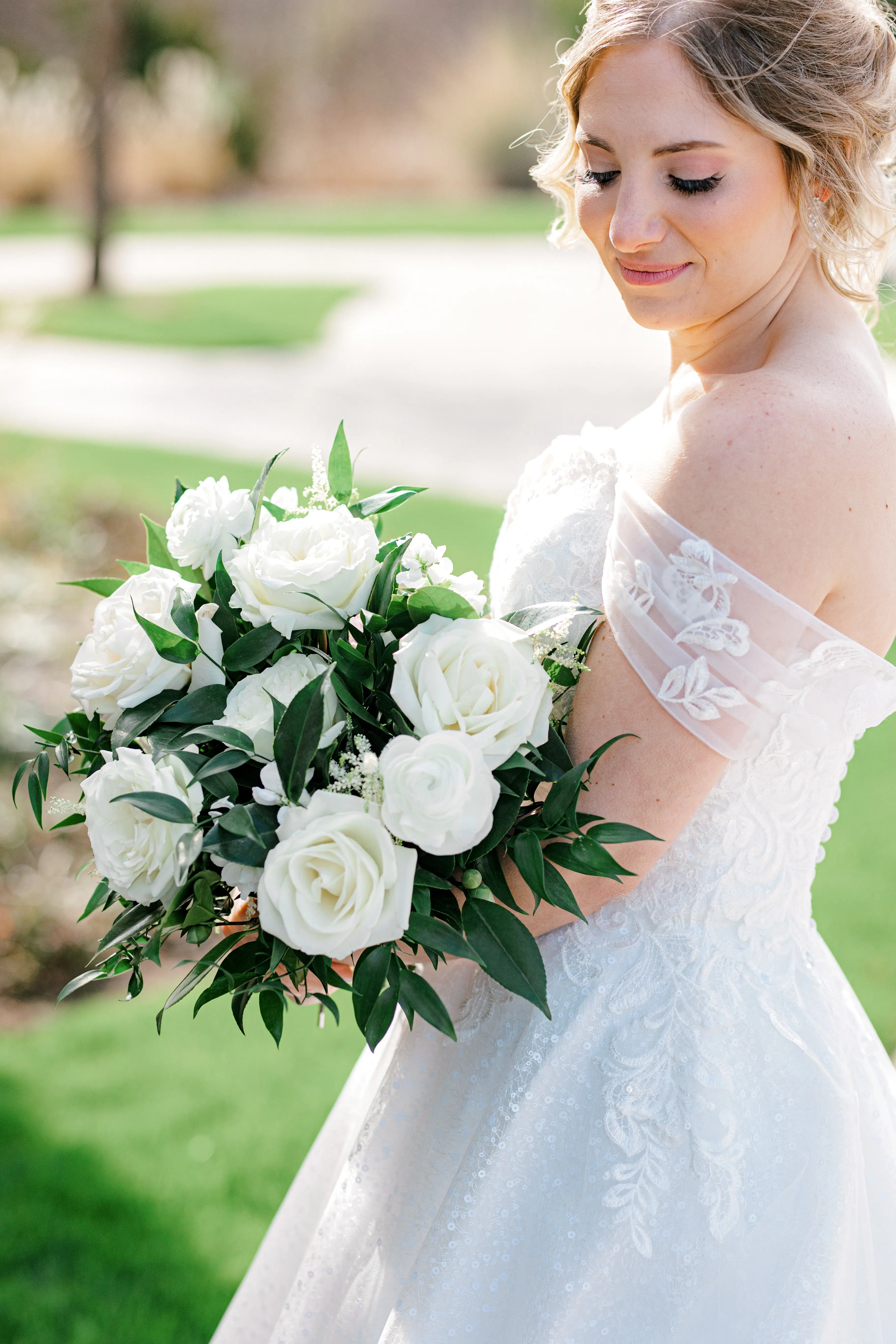 Bride with her Bouquet In Chic Lace Ball Gown Wedding Dress Called Tristyn By Maggie Sottero