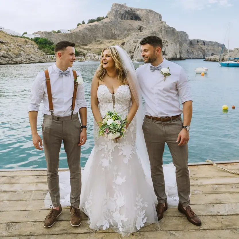 Bride wearing Hattie wedding dress by Rebecca Ingram with friends