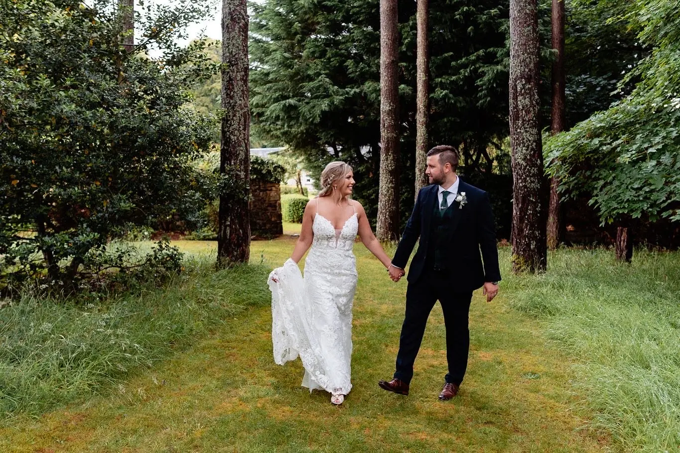 Groom with Bride in Romantic Lace Sheath Wedding Gown with Shimmering Lace Motifs Called Tuscany Lynette by Maggie Sottero
