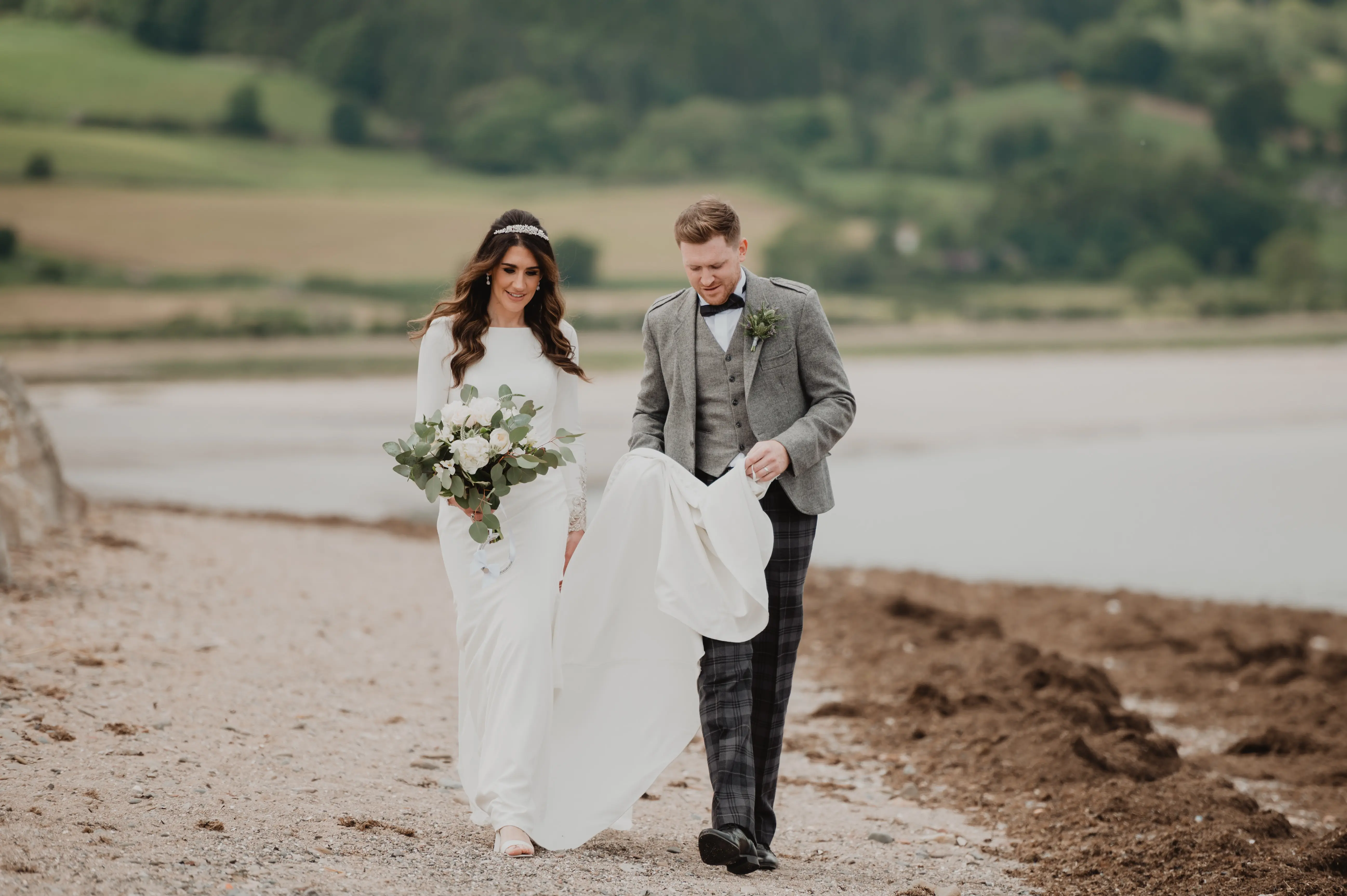 Real Bride in Crepe Fit-and-Flare Wedding Dress with a Statement Back of Beaded Illusion Embroidery Featuring Swarovski Crystals Called Aston by Sottero & Midgely