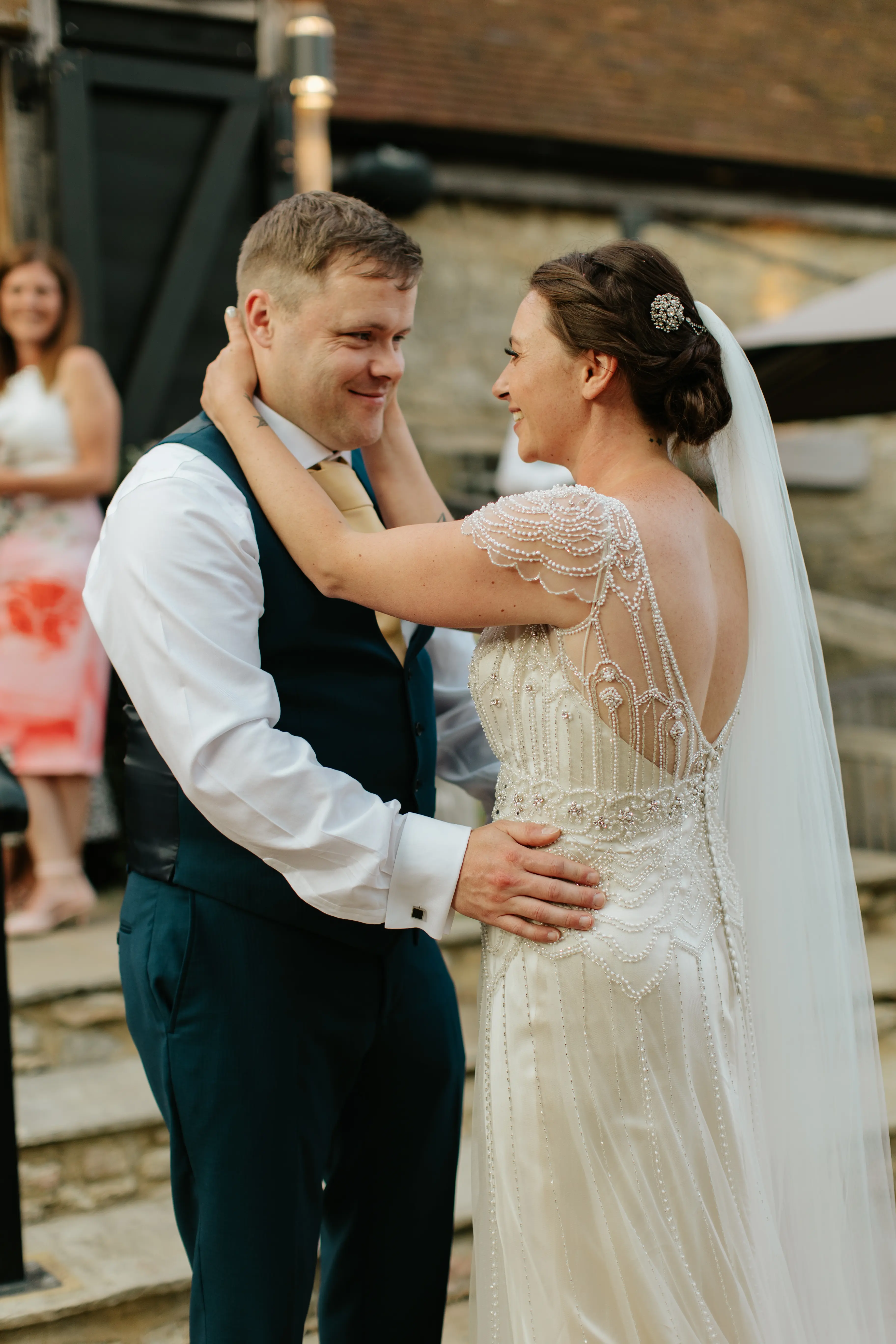 Groom With Bride Wearing Ivory Satin Sheath Wedding Dress Ettia By Maggie Sottero