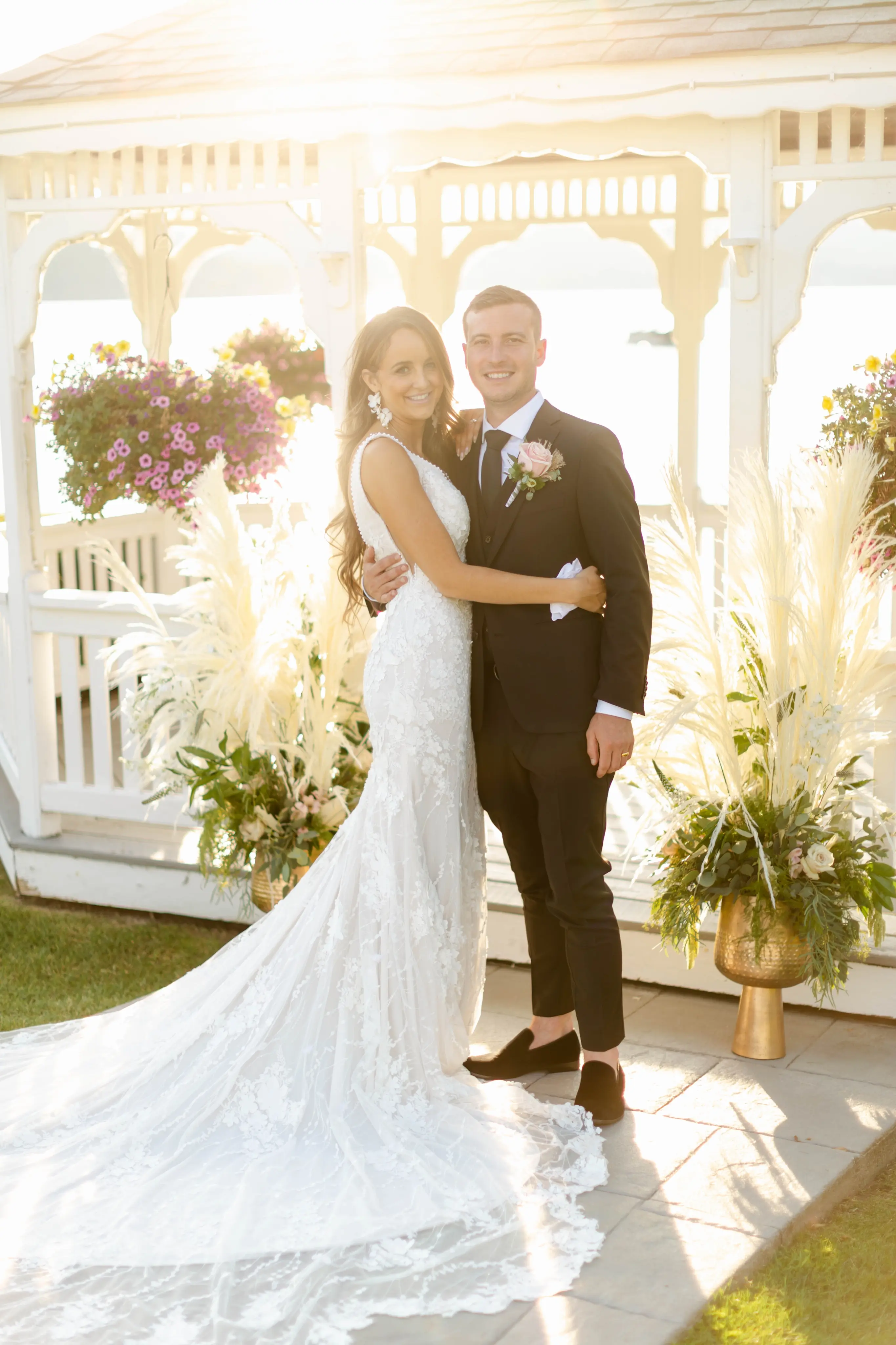 Groom with Bride in Mermaid Wedding Dress with 3-D Floral Motifs Called Cruz by Sottero & Midgley