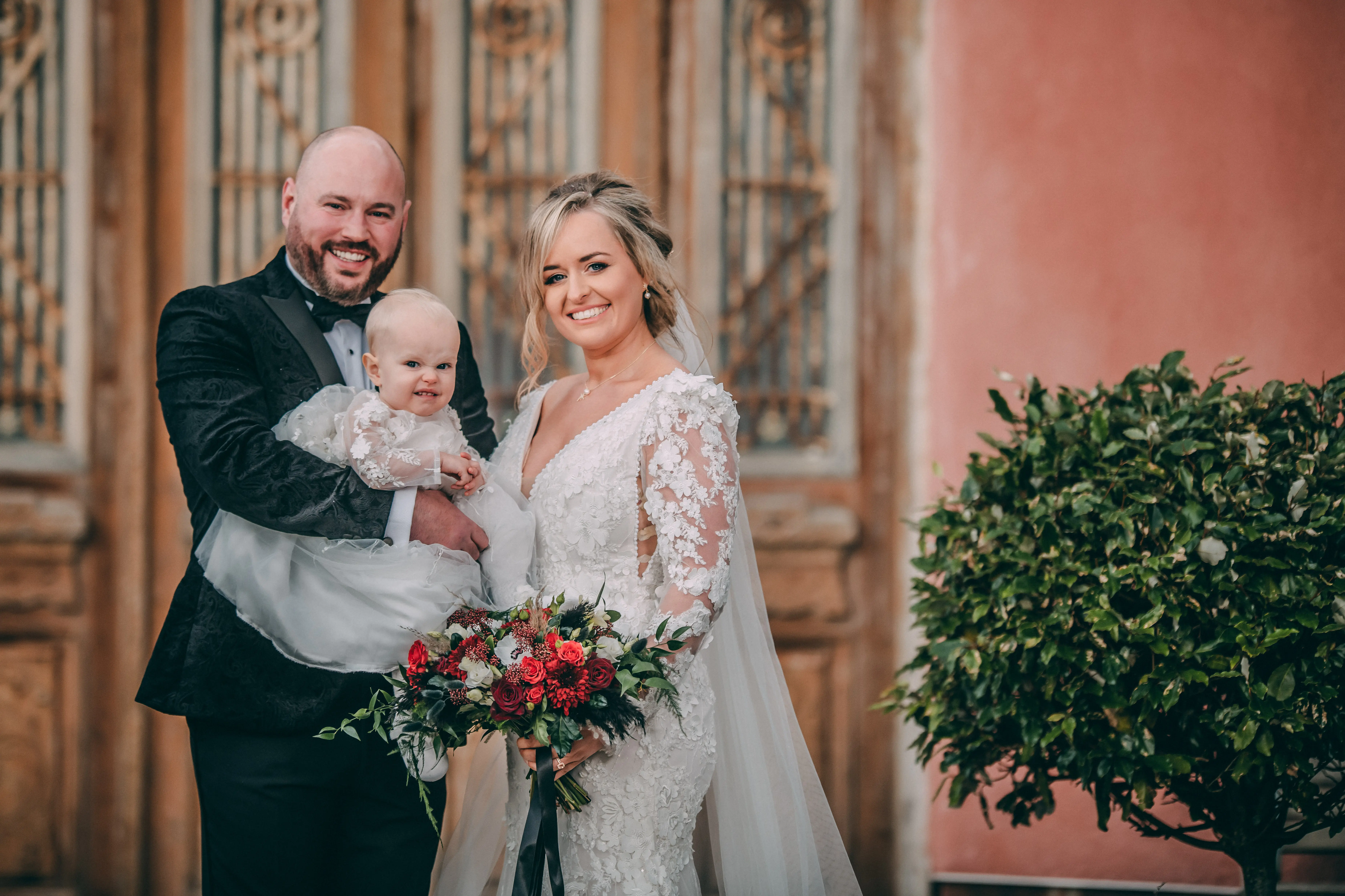 Groom With Bride Wearing Vintage Mermaid Wedding Dress With 3-D Floral Motifs Cruz By Sottero And Midgley