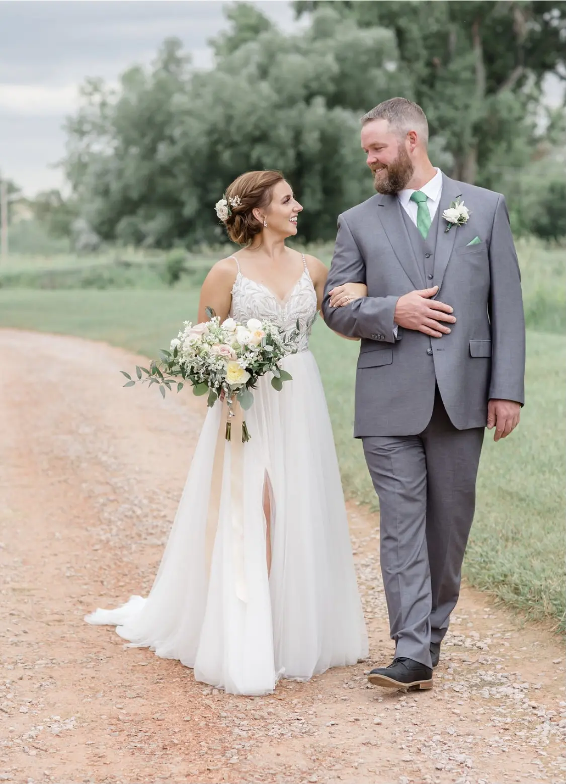Groom With Bride Wearing Relaxed A-Line Wedding Dress Called Charlene By Maggie Sottero