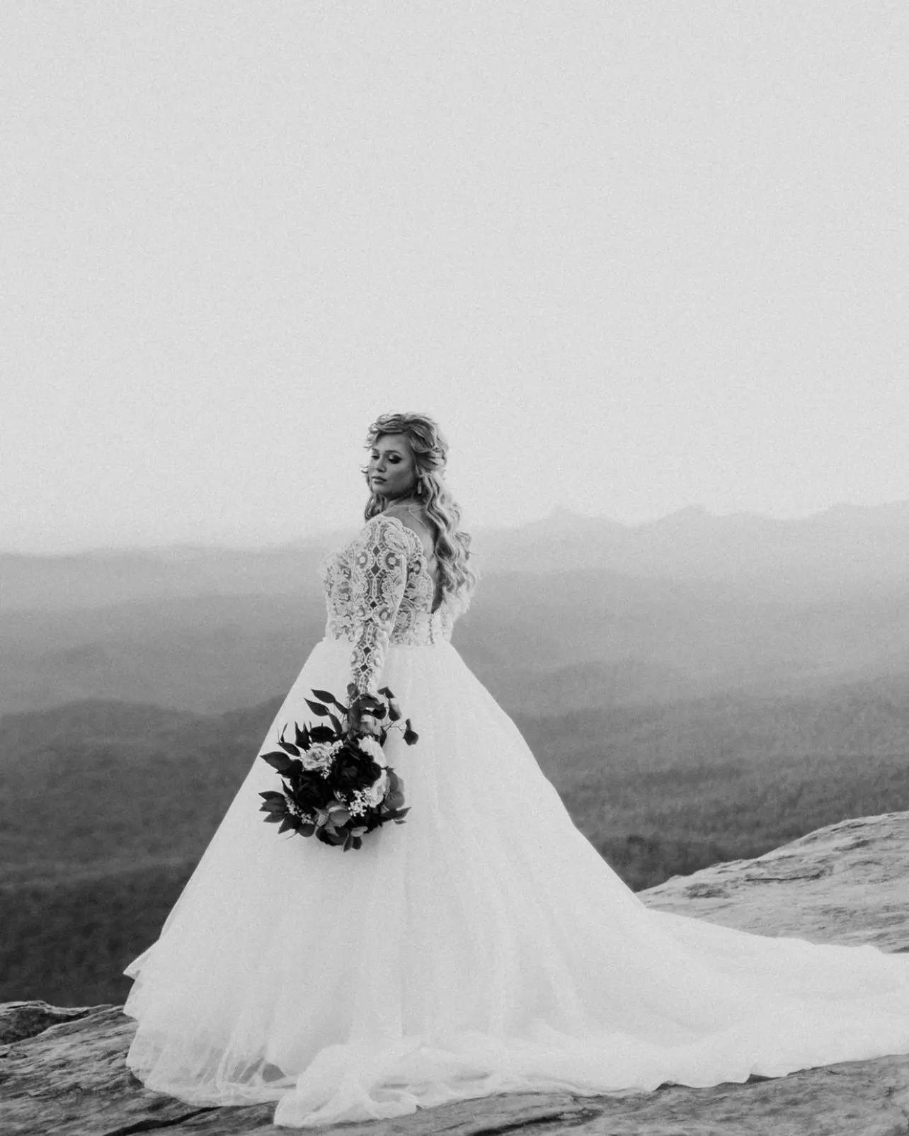 Bride In Long Sleeve Lace Ball Gown Wedding Dress Named Mallory Dawn By Maggie Sottero