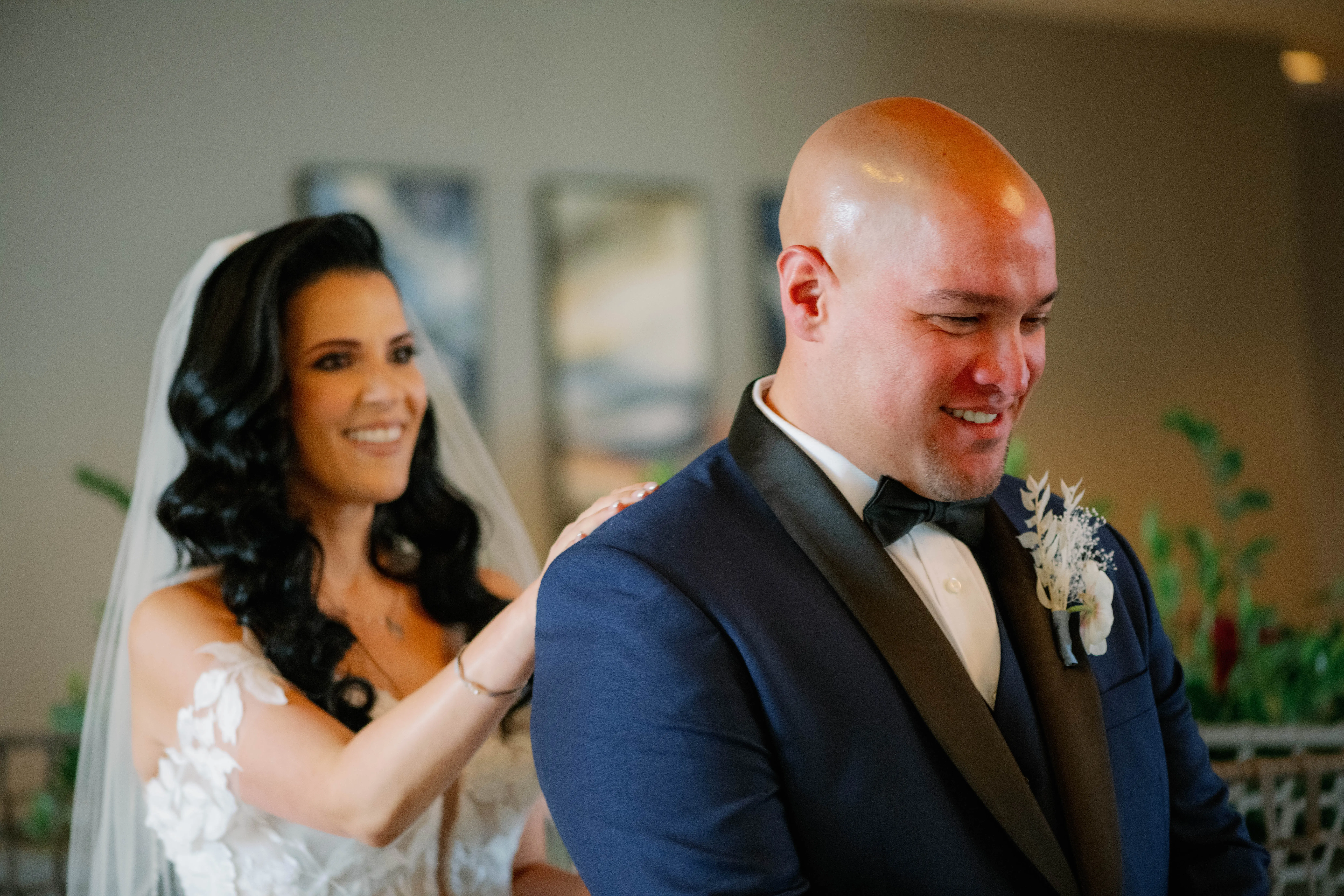 Bride Wearing Lace Mermaid Wedding Gown Called Hattie By Rebecca Ingram With The Groom Doing A First Look