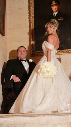 Bride wearing Anniston Marie wedding dress by Maggie Sottero with her husband