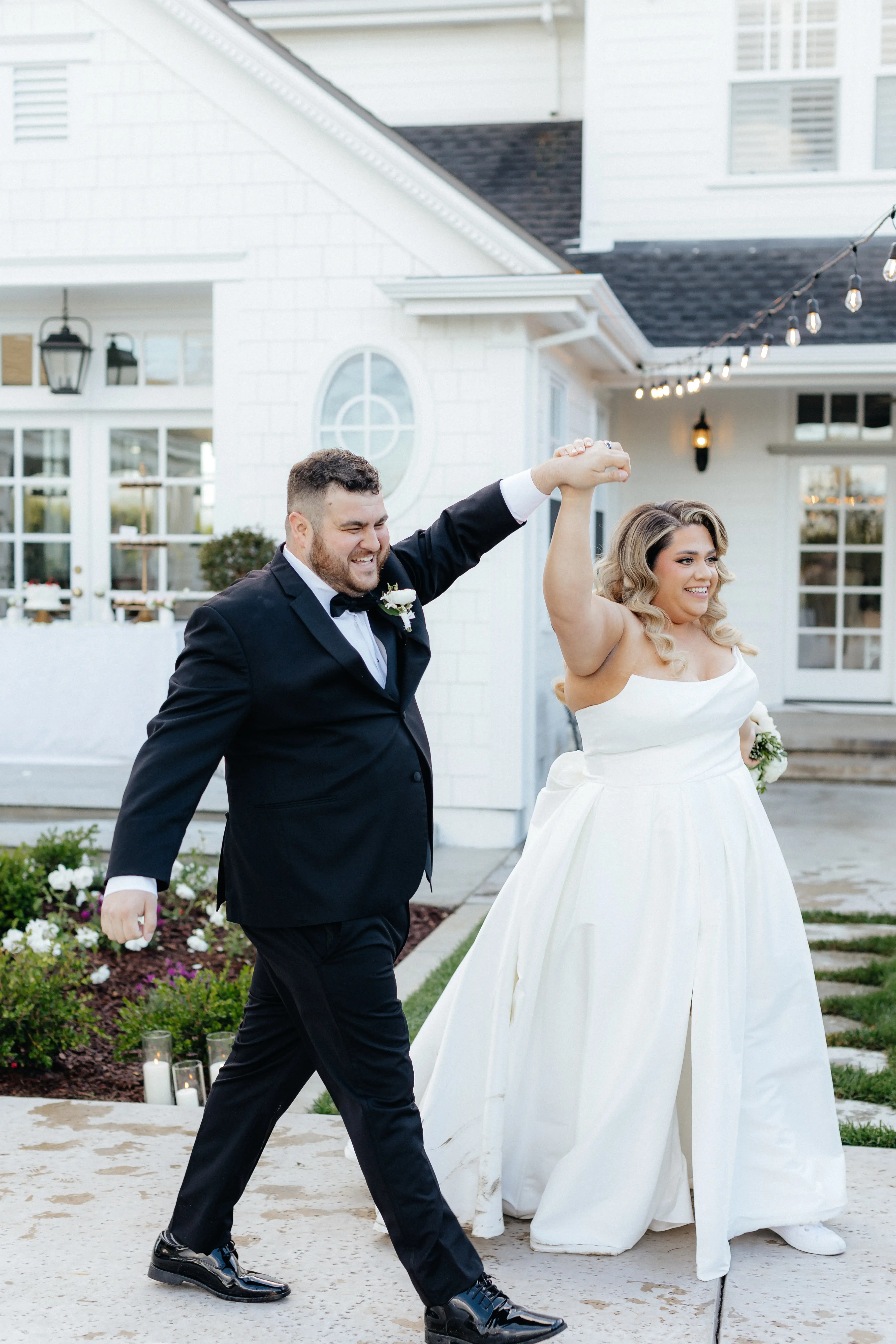 Bride wearing Aspen by Sottero and Midgley celebrating with her husband