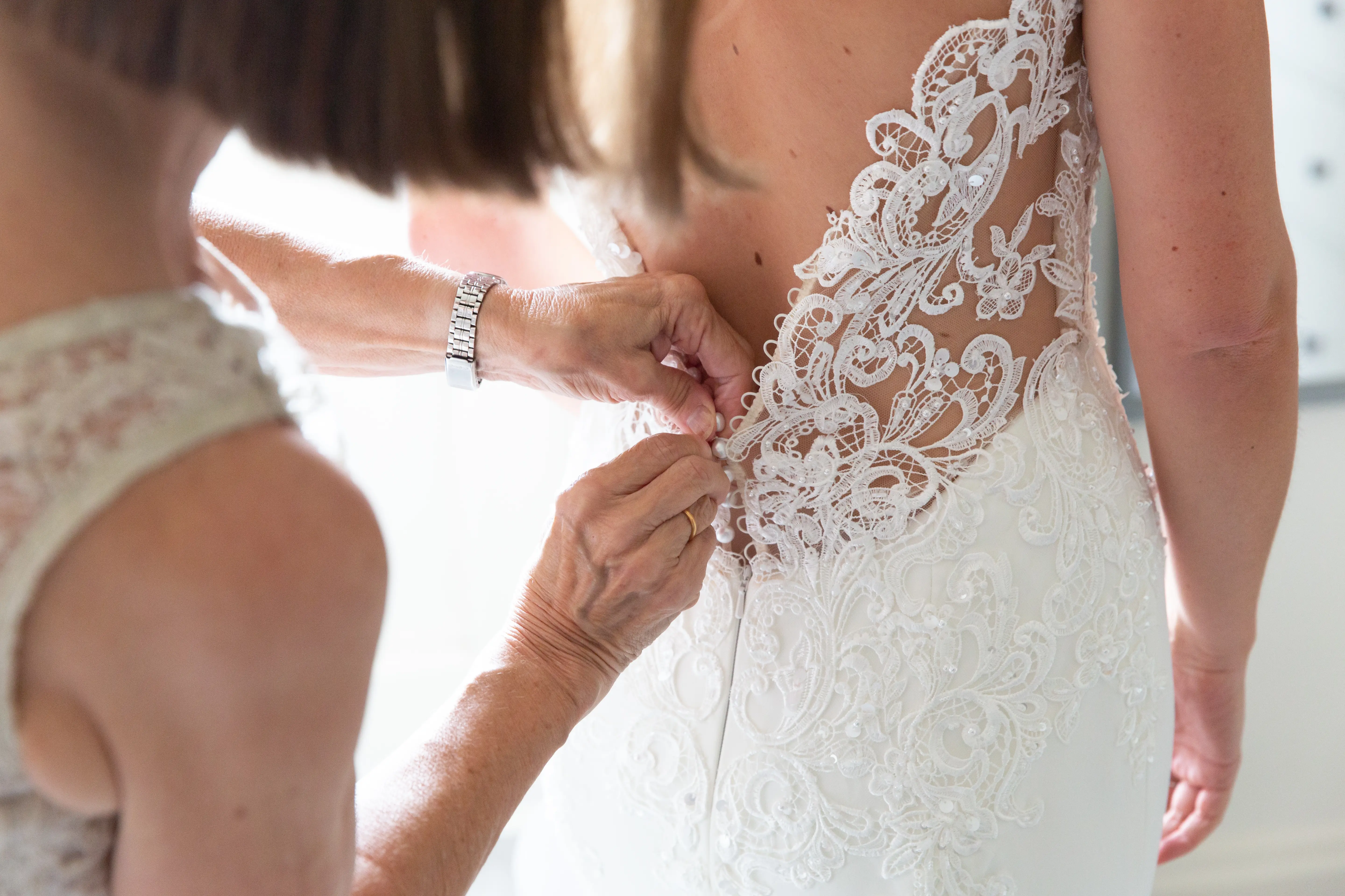 Bride wearing crepe sheath wedding dress