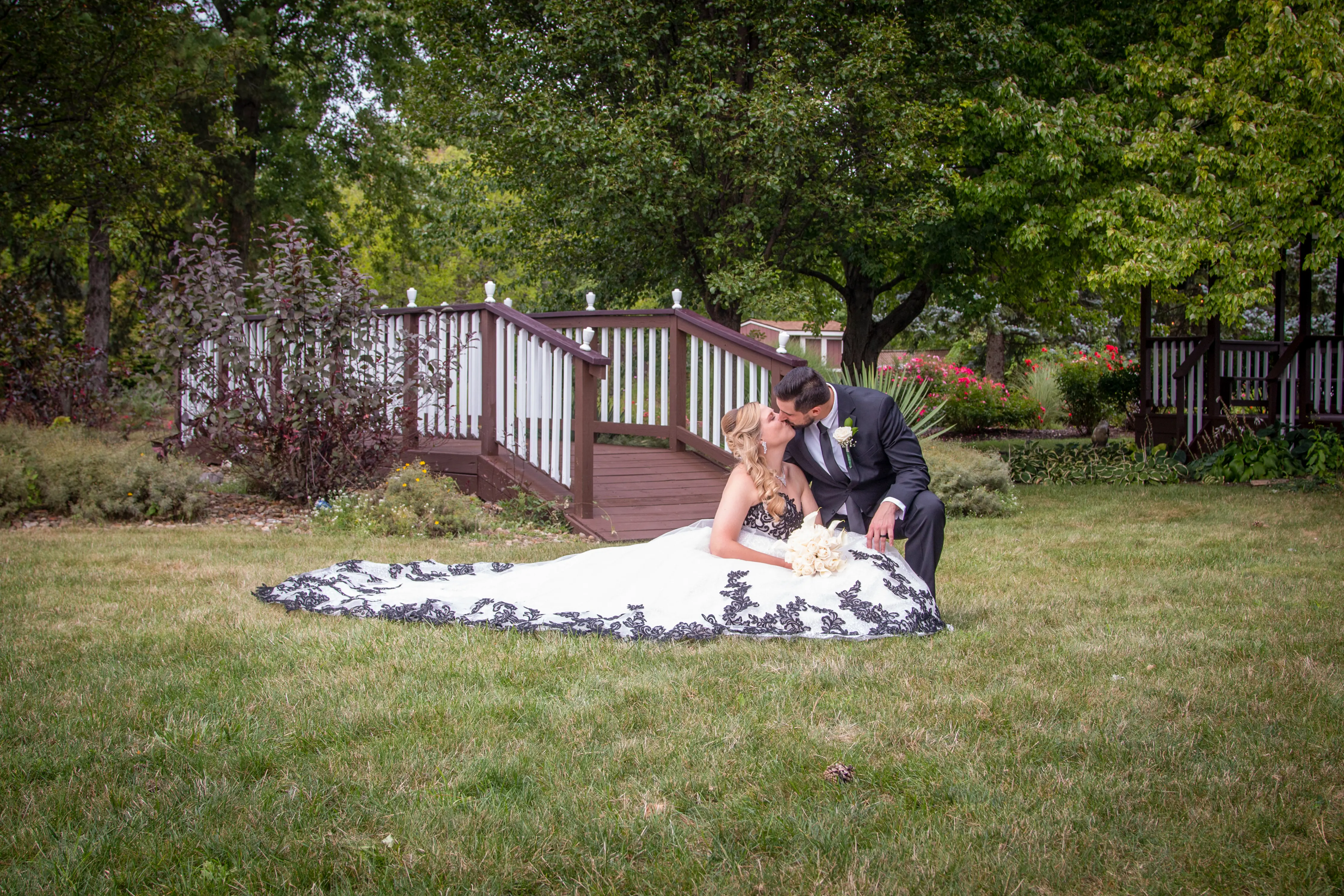 Bride Wearing A-Line Black Lace Wedding Dress Called Tristyn By Maggie Sottero With Groom