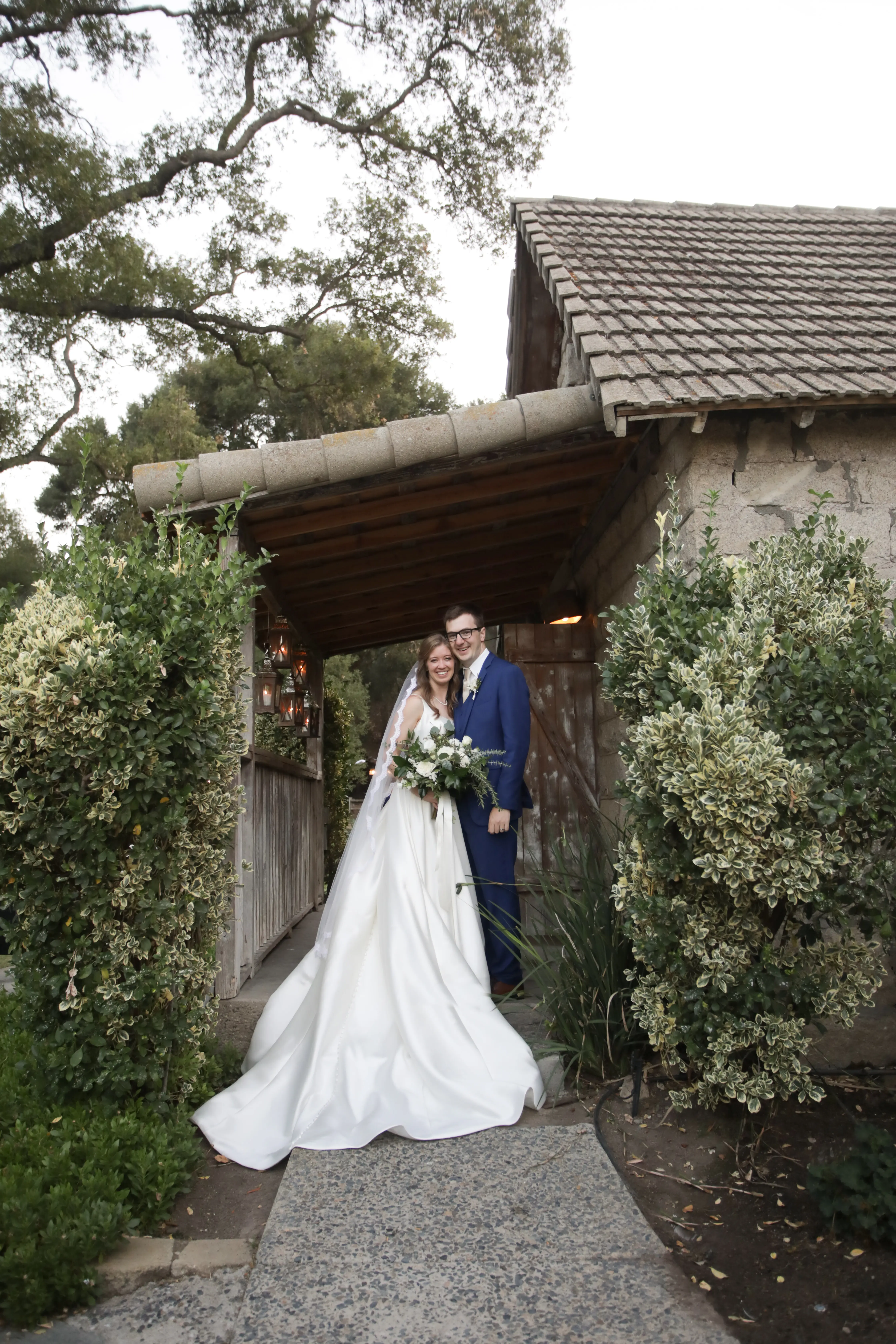Groom and Bride wearing Simple Ballgown Wedding Dress called Selena by Maggie Sottero