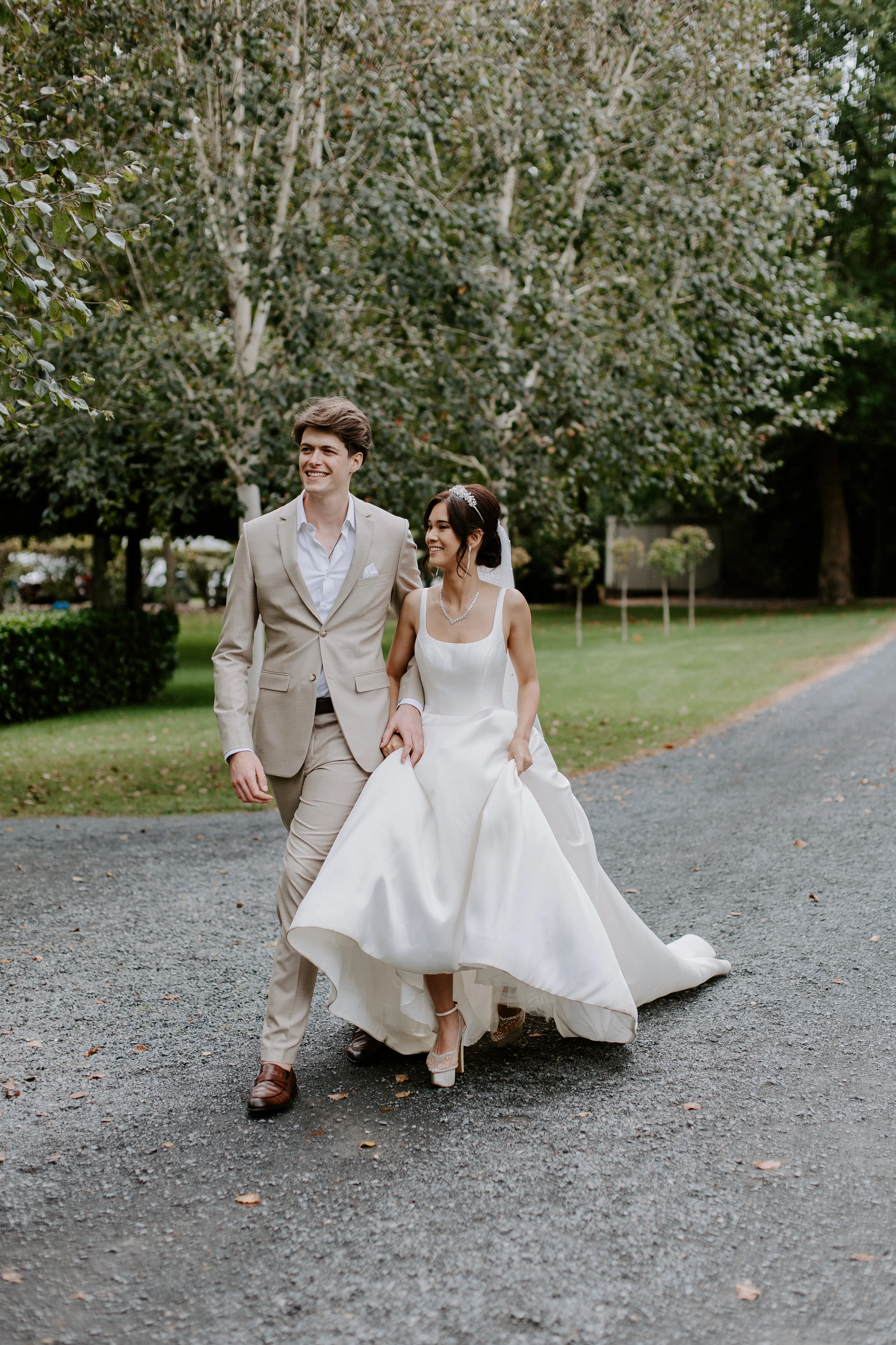 Bride In Satin A-Line Wedding Dress Called Selena By Maggie Sottero With Groom