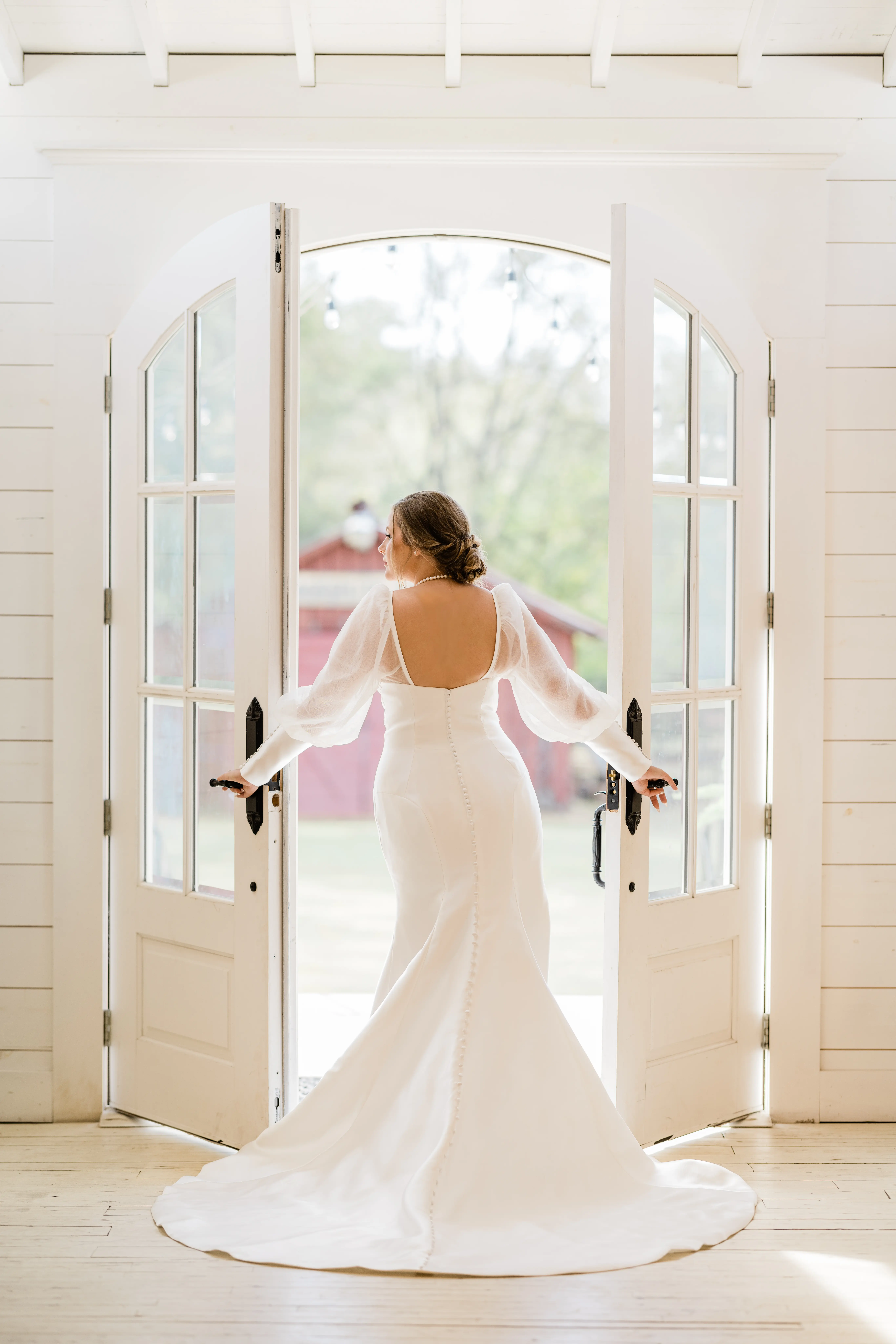 Bride Showing Off Back Of Minimal Mermaid Mikado Dress Called Pippa By Rebecca Ingram
