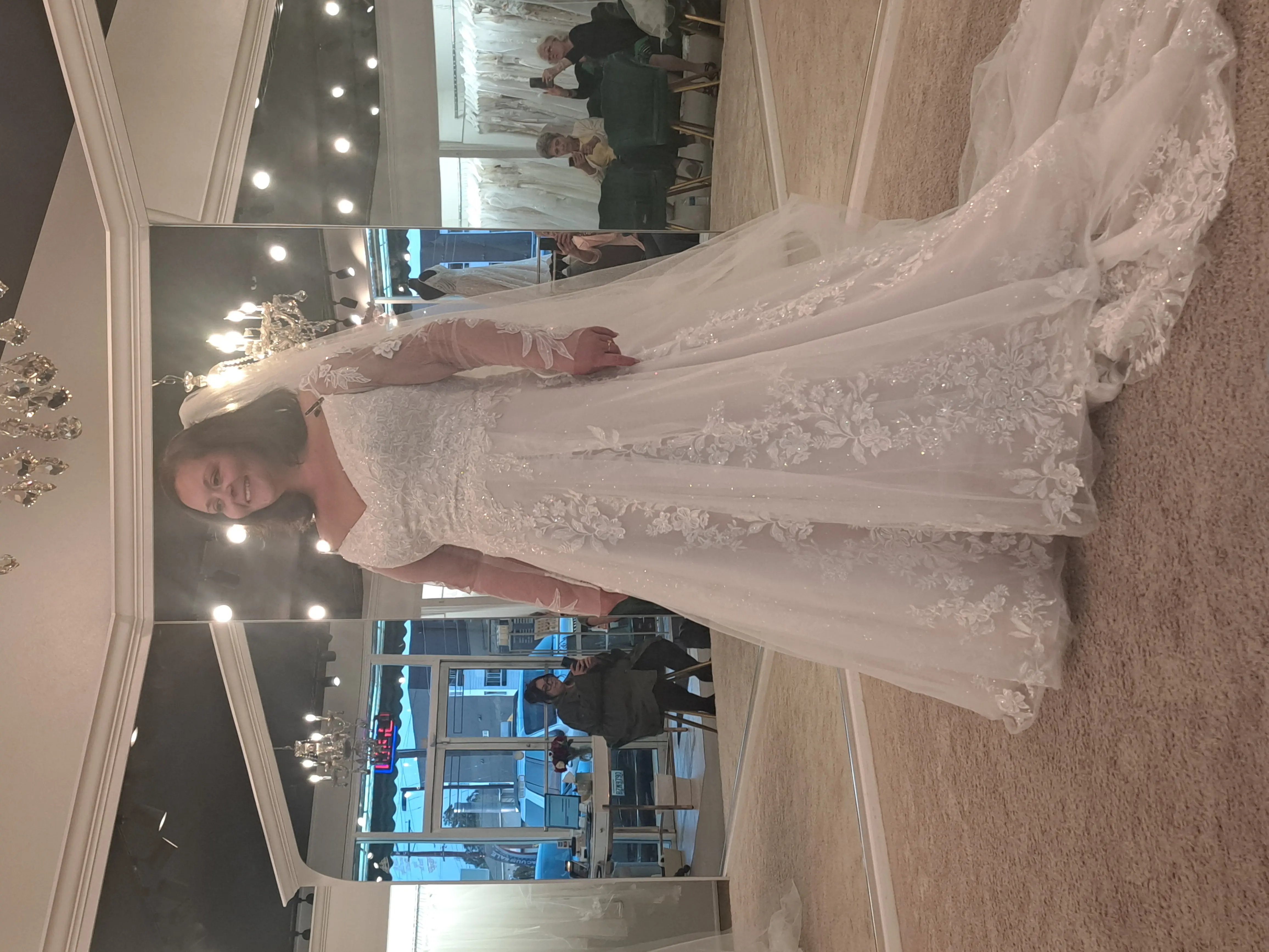 Bride wearing Flynn wedding gown by Maggie Sottero