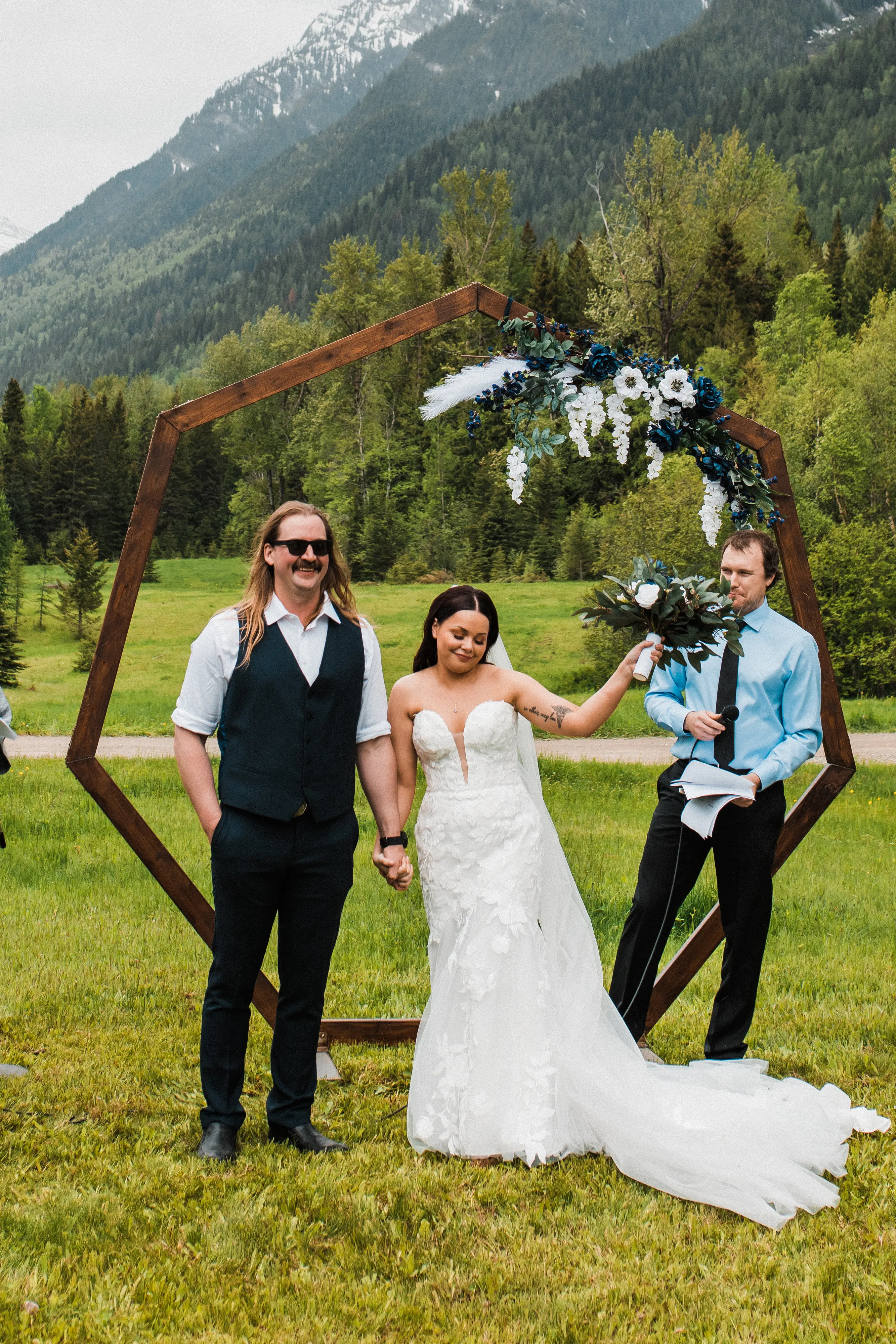 Groom At The Alter With Bride Wearing A Garden Inspired Wedding Dress Named Hattie By Rebecca Ingram