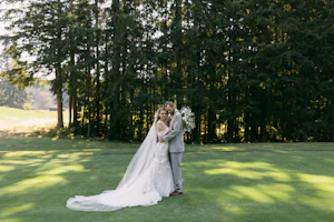 Bride in Strapless Mermaid Wedding Dress Named Hattie By Rebecca Ingram Bride and Groom In Woods