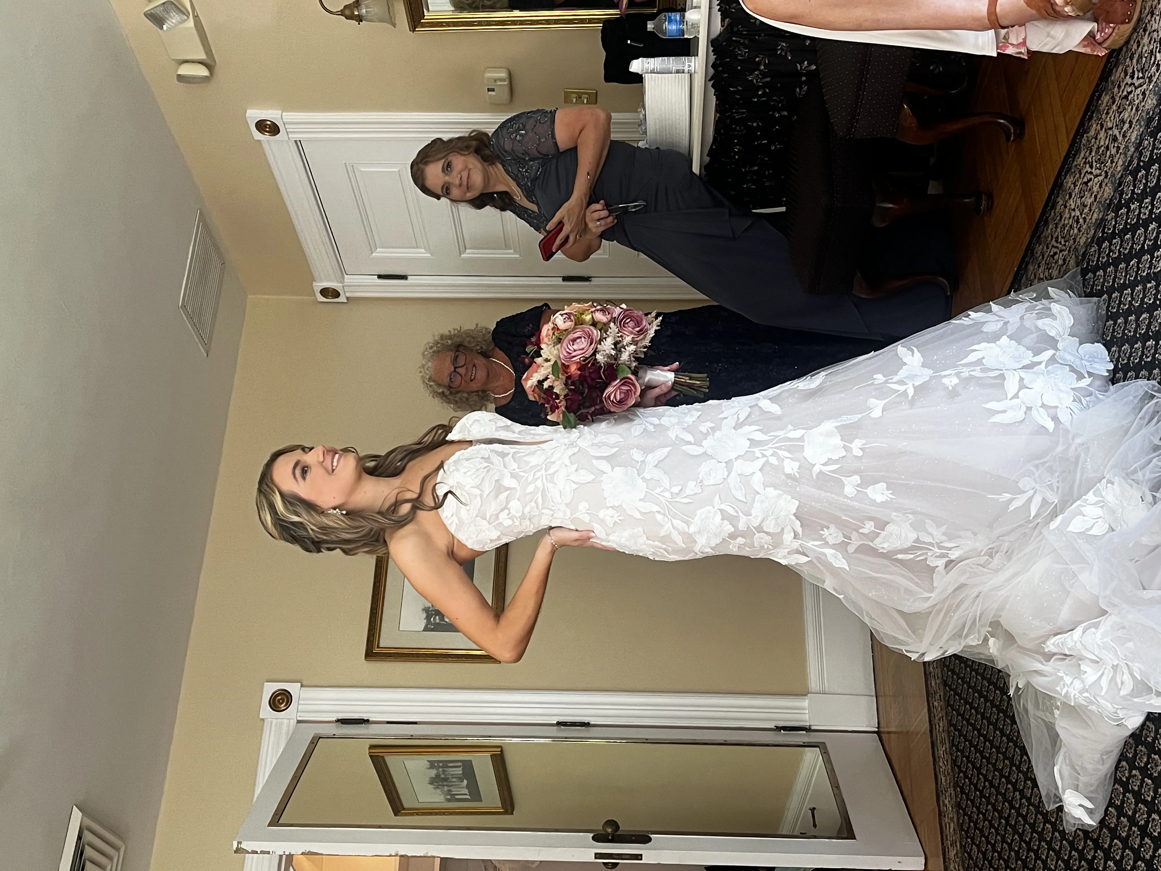 Bride wearing Hattie Marie by Rebecca Ingram