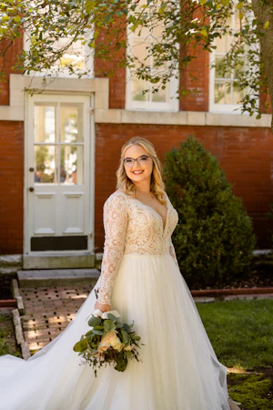 Bride In Plunging Lace Illusion Neckline Called Mallory Dawn By Maggie Sottero