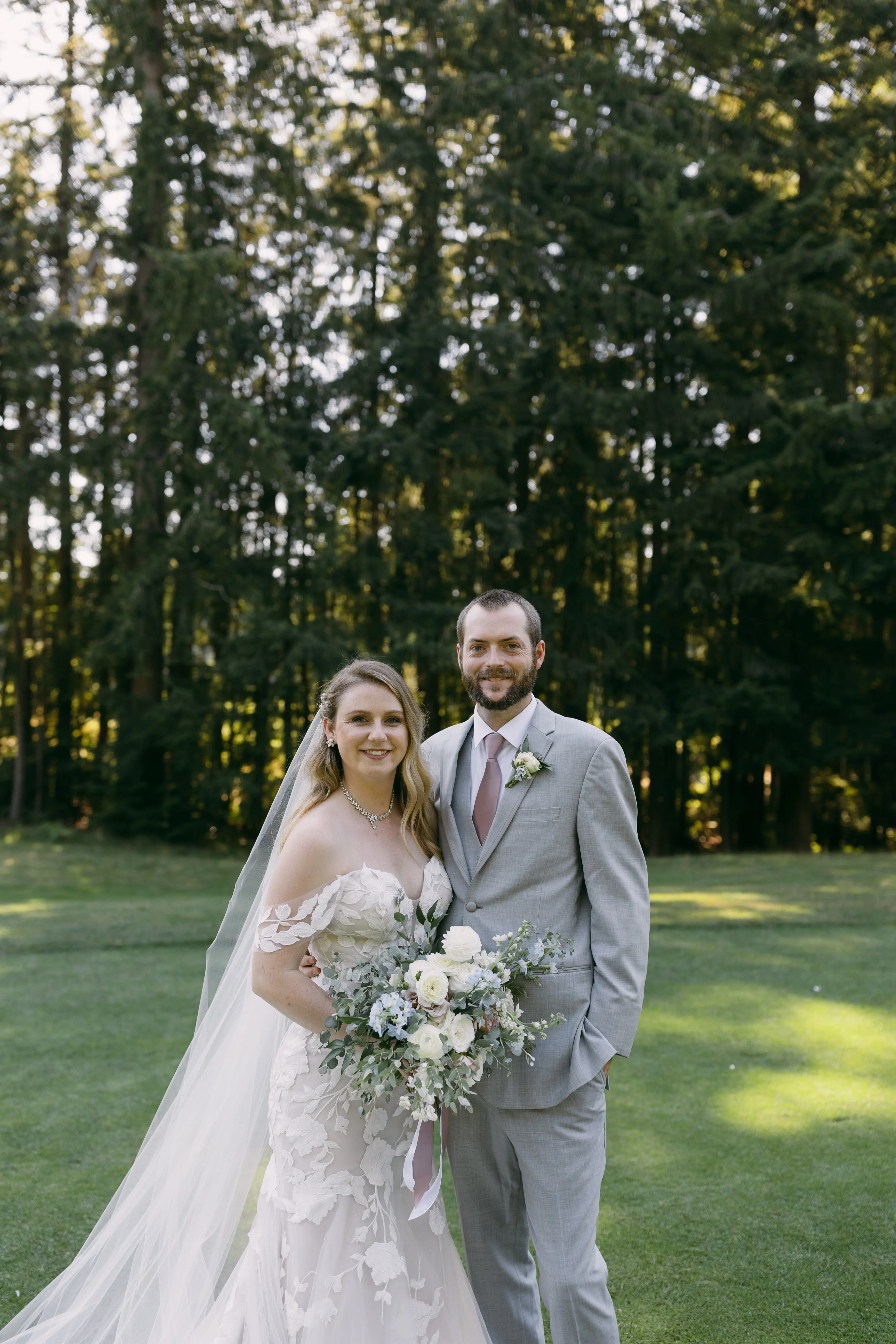 Bride in Strapless Mermaid Wedding Dress Named Hattie By Rebecca Ingram Bride And Groom Smiling