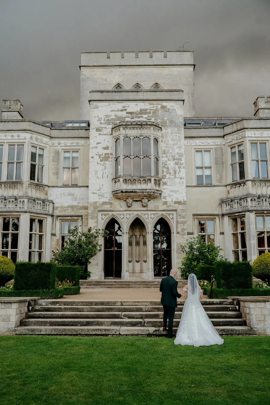 Bride wearing Harlem by Maggie Sottero with her husband