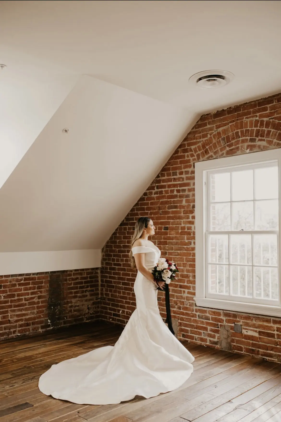 Bride In Off-the-Shoulder Fit-and-Flare Josie Rebecca Ingram