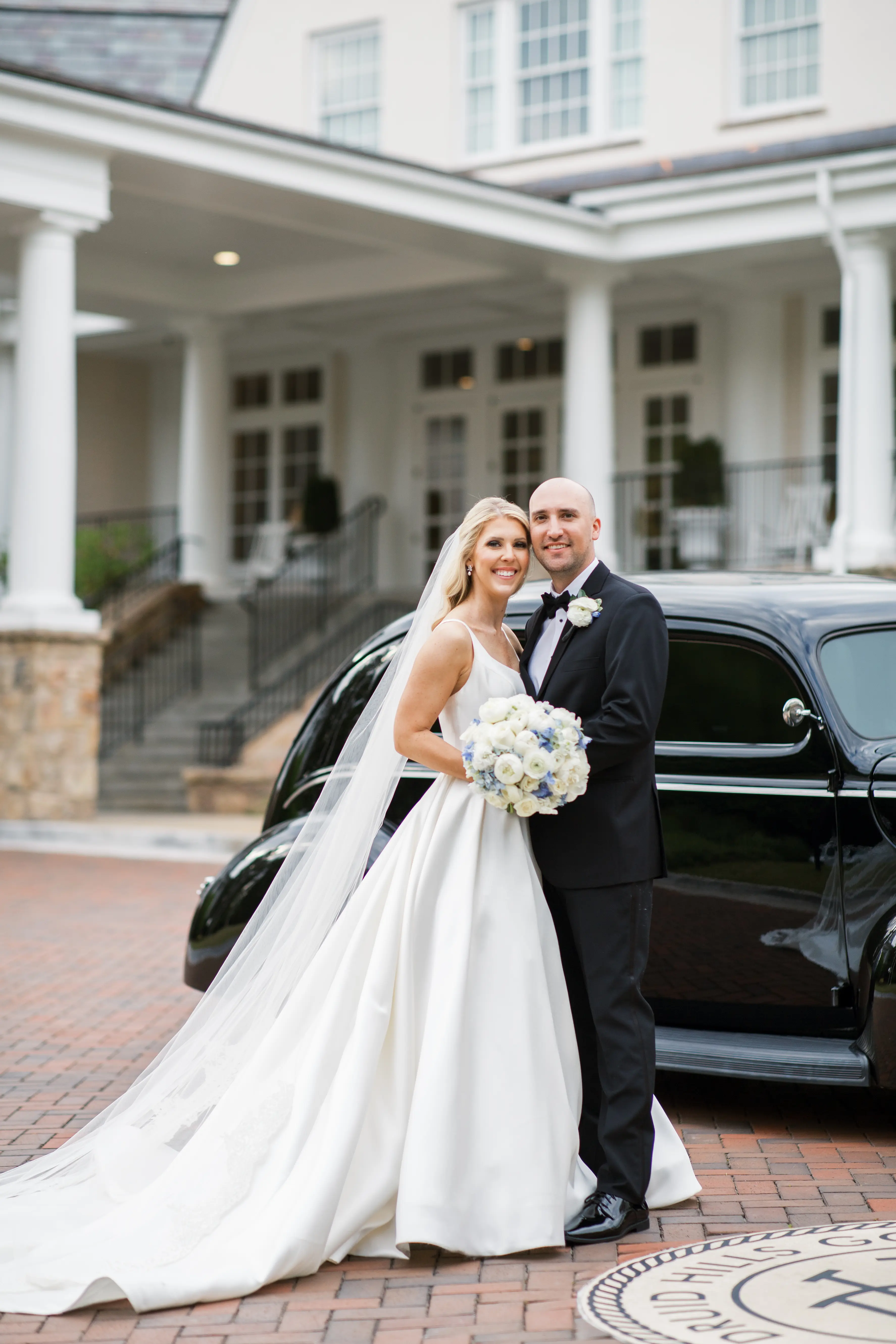 Bride In Satin A-Line Wedding Dress Called Selena By Maggie Sottero With Groom