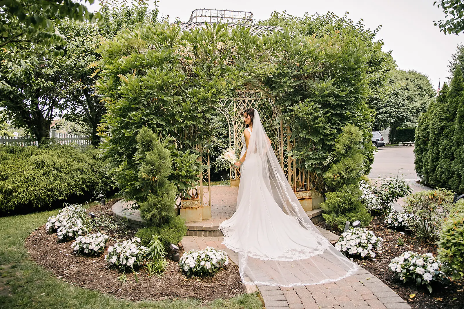 bride in lace crepe sheath wedding dress