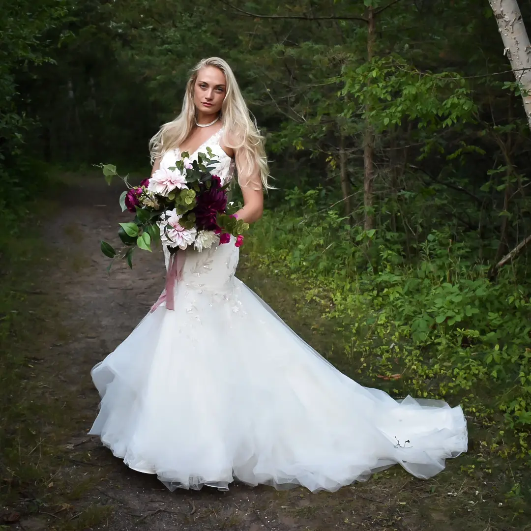 Bride Wearing Trumpet Wedding Dress With Colorful Floral Lace Motifs Kenleigh By Sottero And Midgley